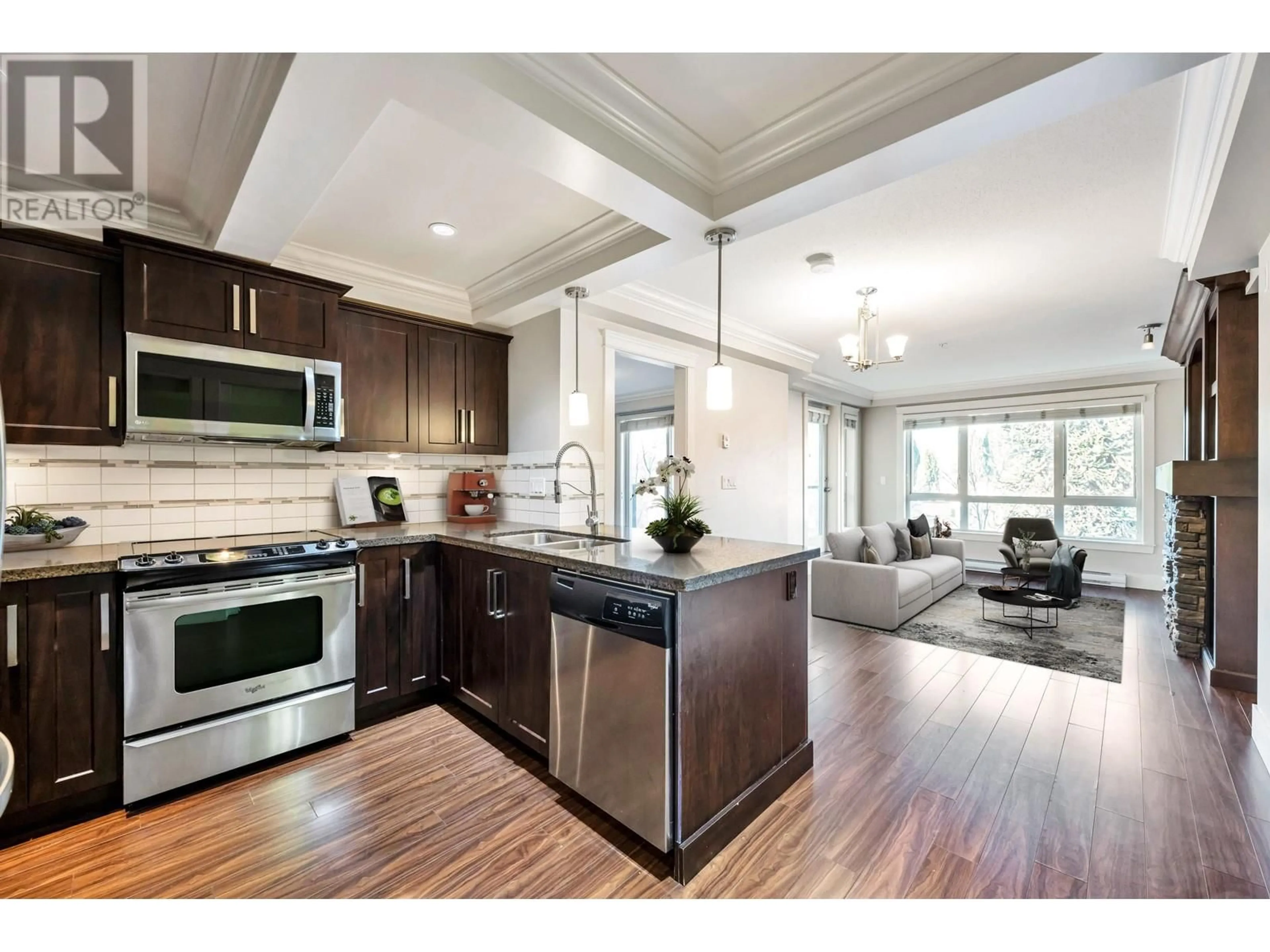 Open concept kitchen, wood/laminate floor for 309 - 2175 FRASER AVENUE, Port Coquitlam British Columbia V3B0H8
