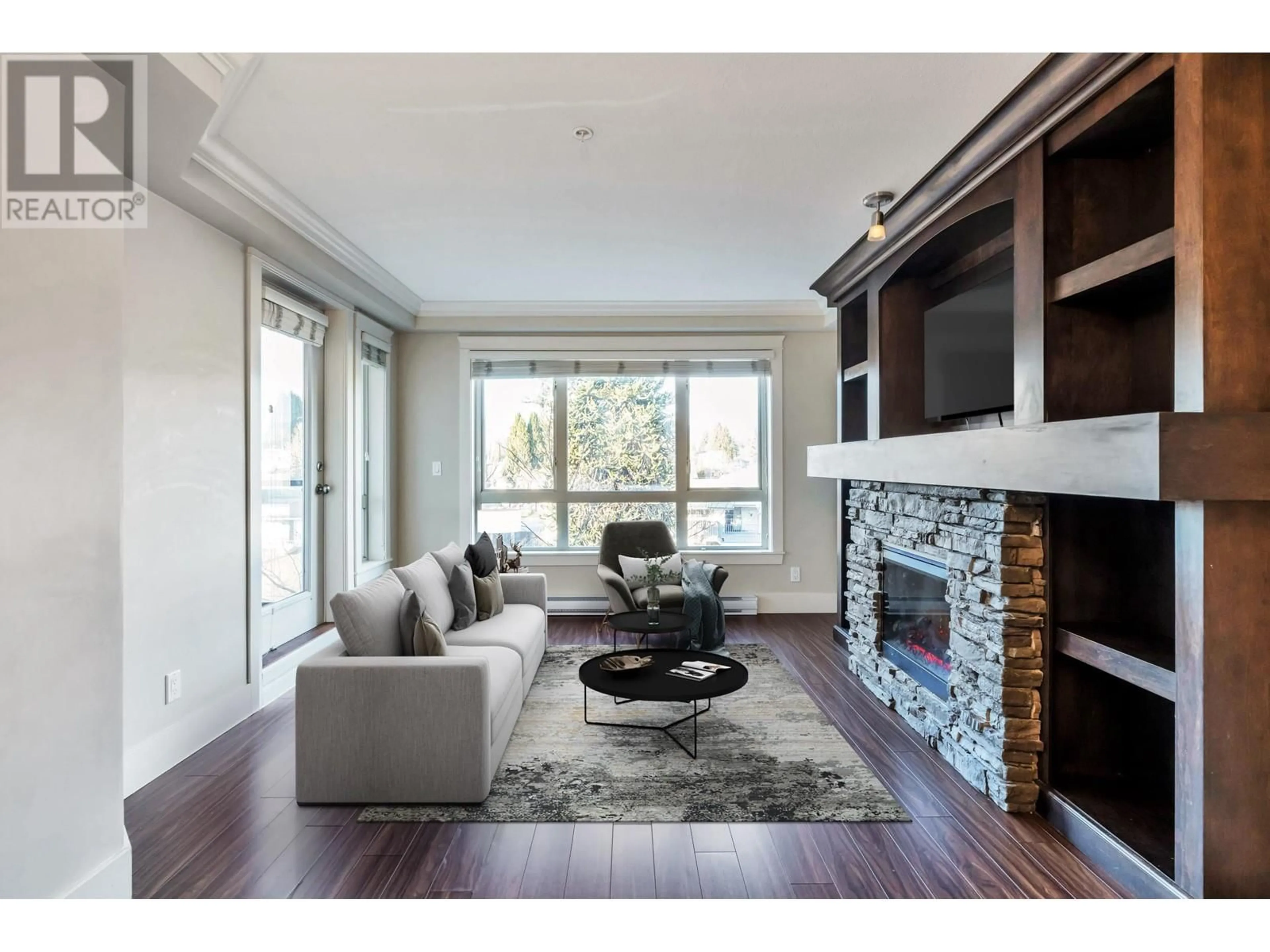 Living room with furniture, wood/laminate floor for 309 - 2175 FRASER AVENUE, Port Coquitlam British Columbia V3B0H8