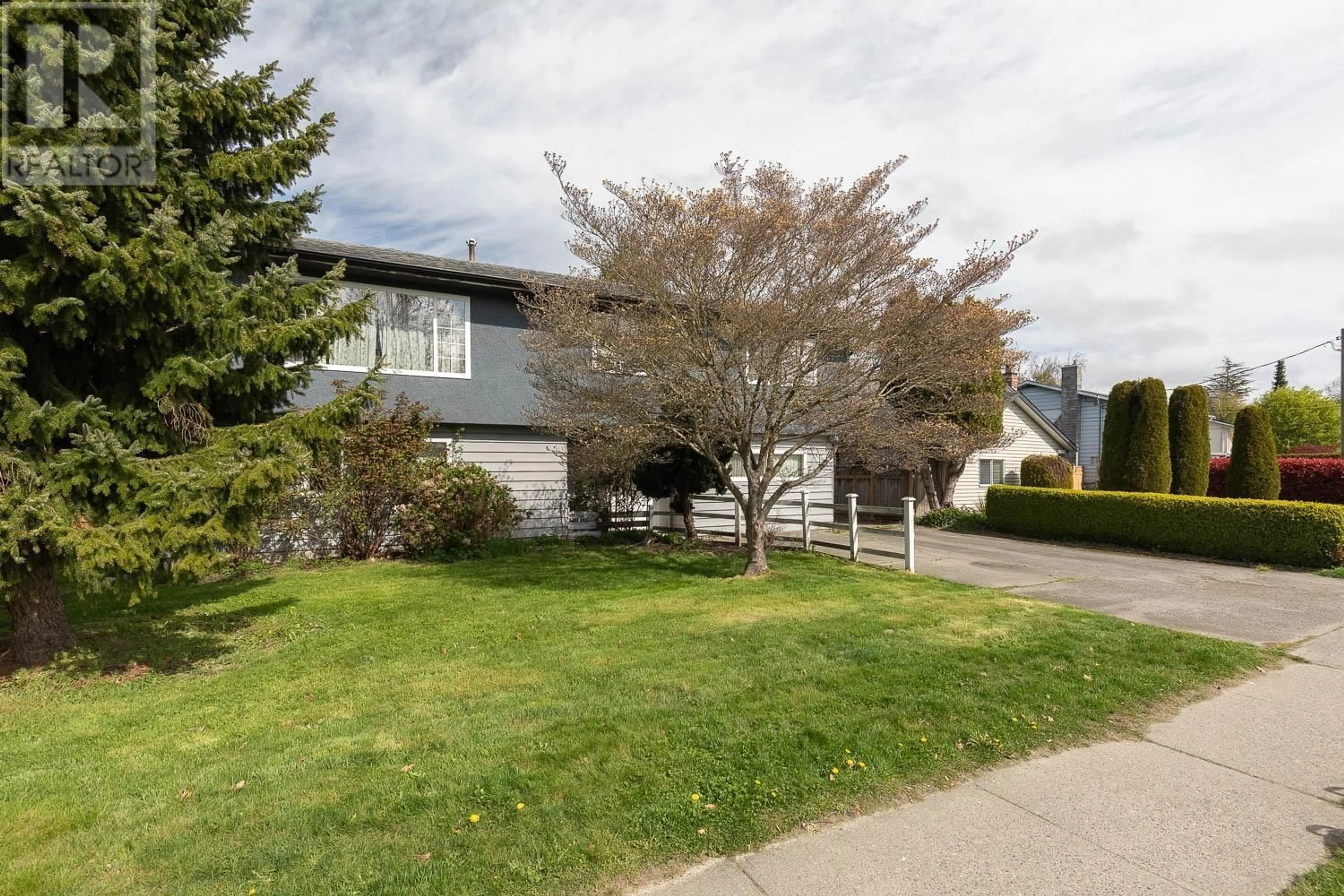 Home with vinyl exterior material, street for 5561 44TH AVENUE, Delta British Columbia V4C1C9