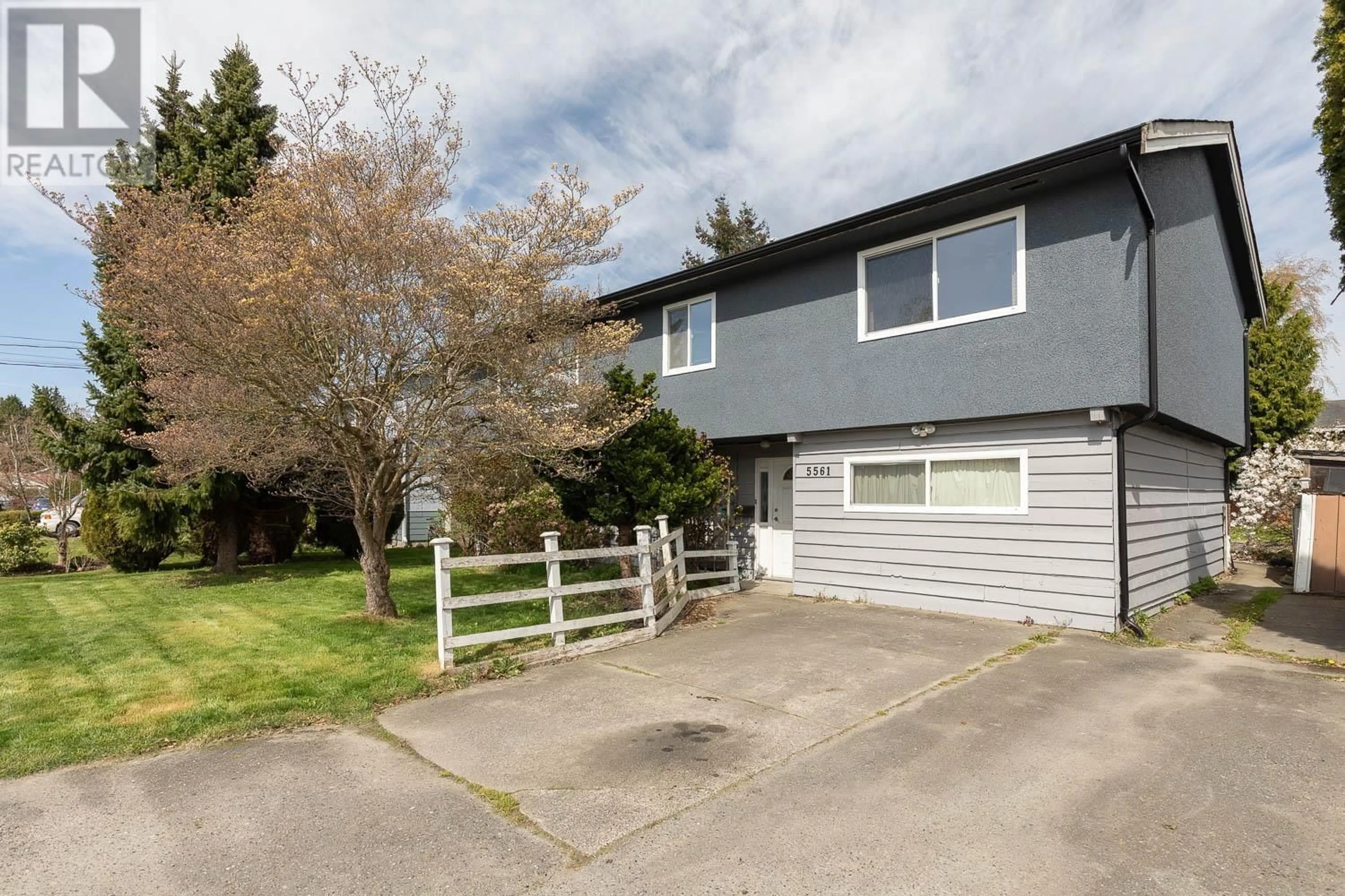 Home with vinyl exterior material, street for 5561 44TH AVENUE, Delta British Columbia V4C1C9
