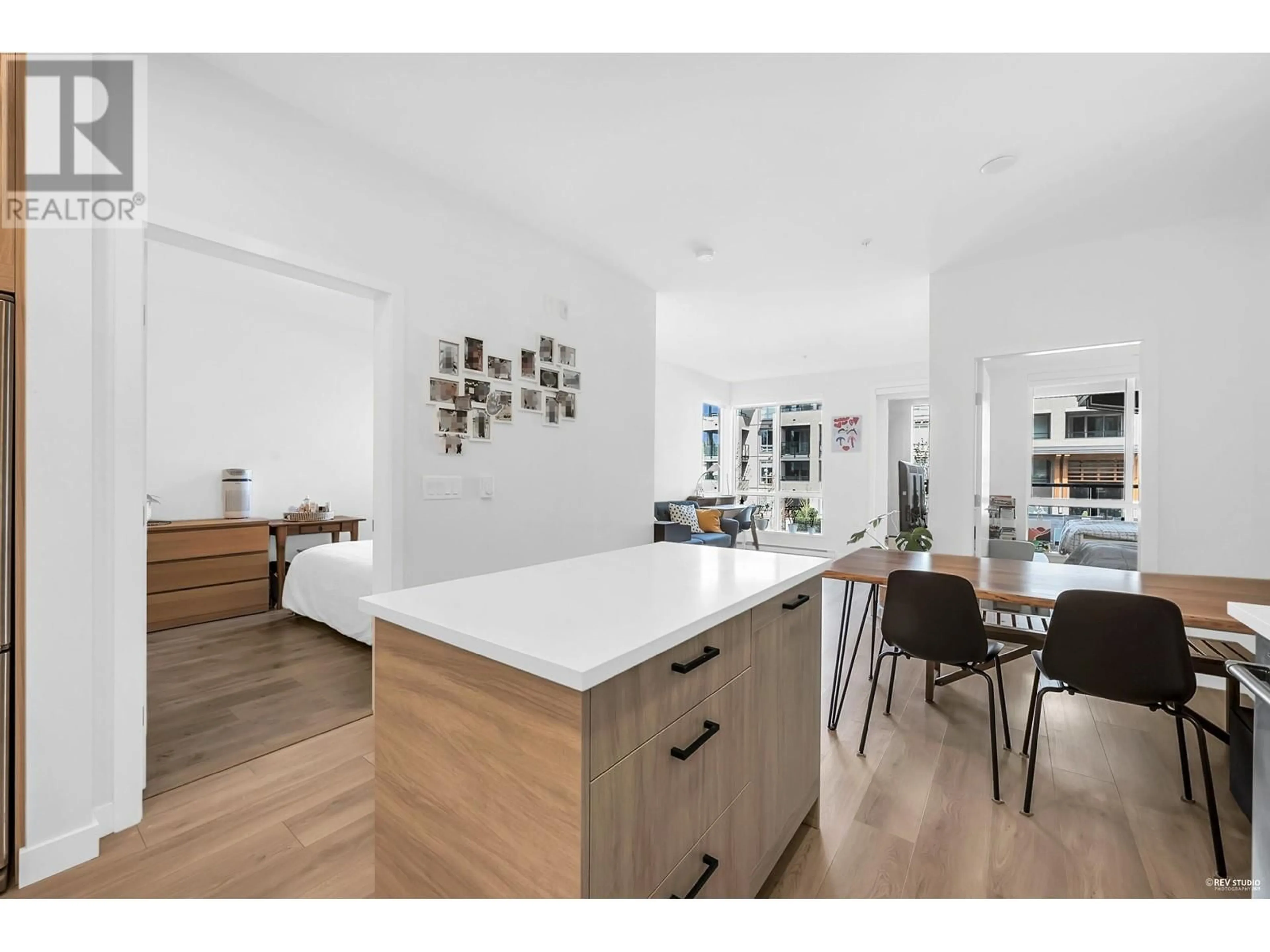 Open concept kitchen, wood/laminate floor for 206 - 7579 16TH STREET, Burnaby British Columbia V3N0H7