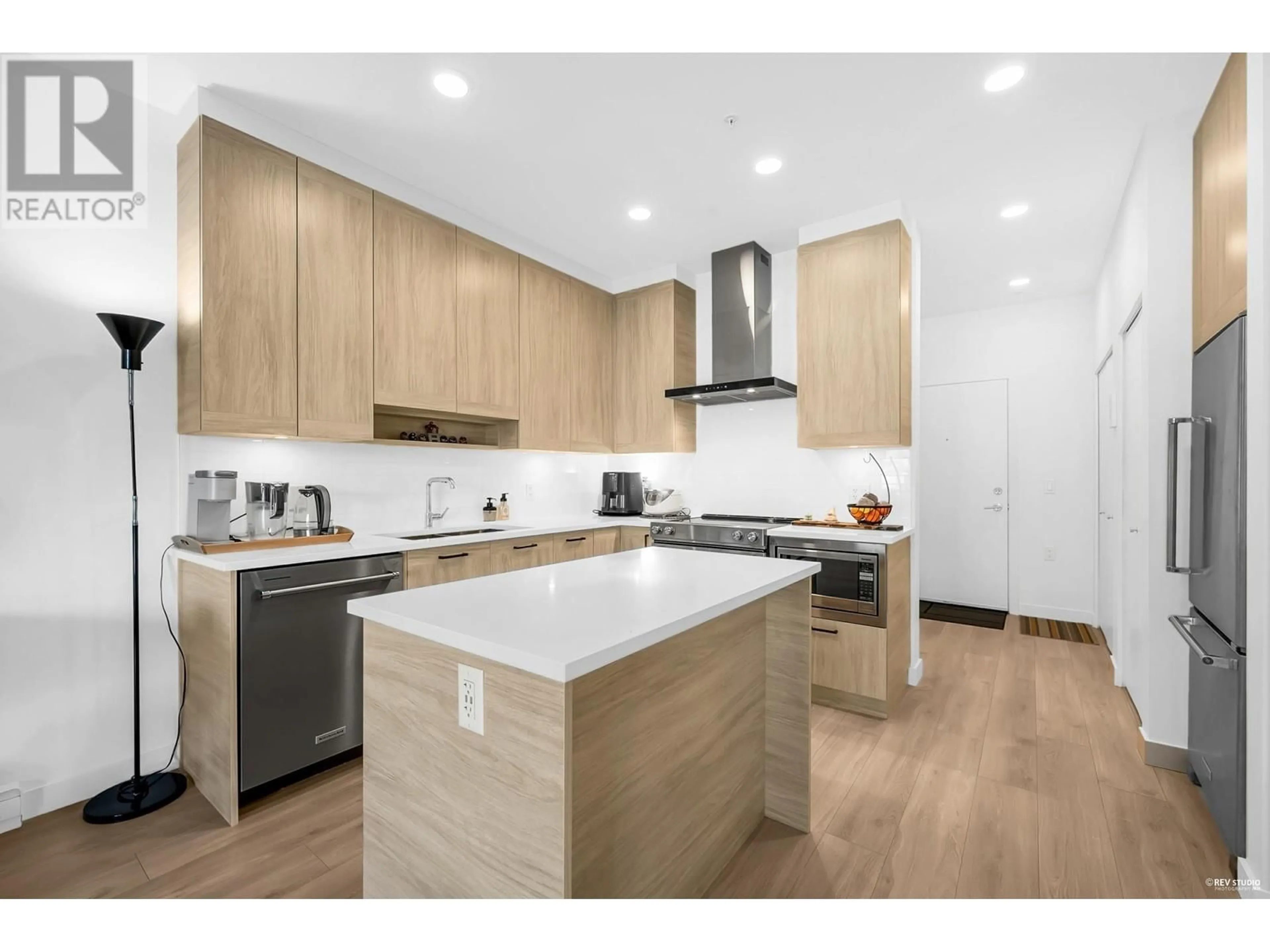 Open concept kitchen, wood/laminate floor for 206 - 7579 16TH STREET, Burnaby British Columbia V3N0H7