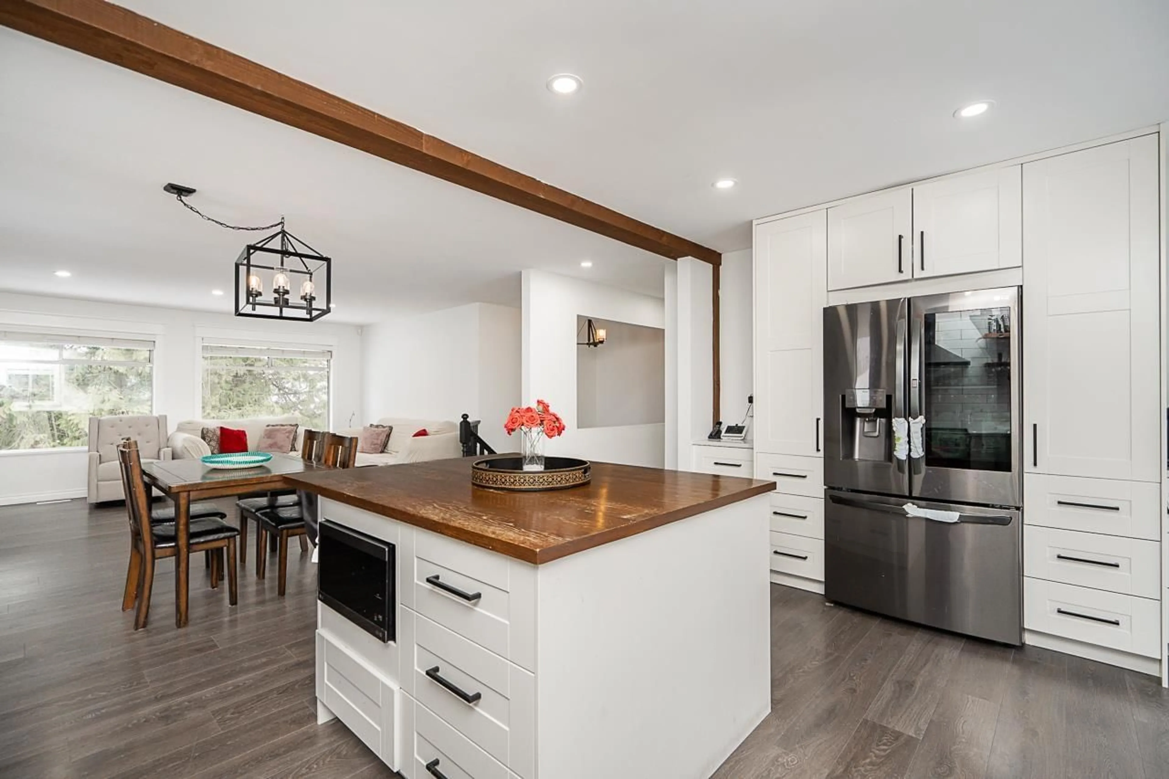 Open concept kitchen, wood/laminate floor for 6074 188 STREET, Surrey British Columbia V3S7V9