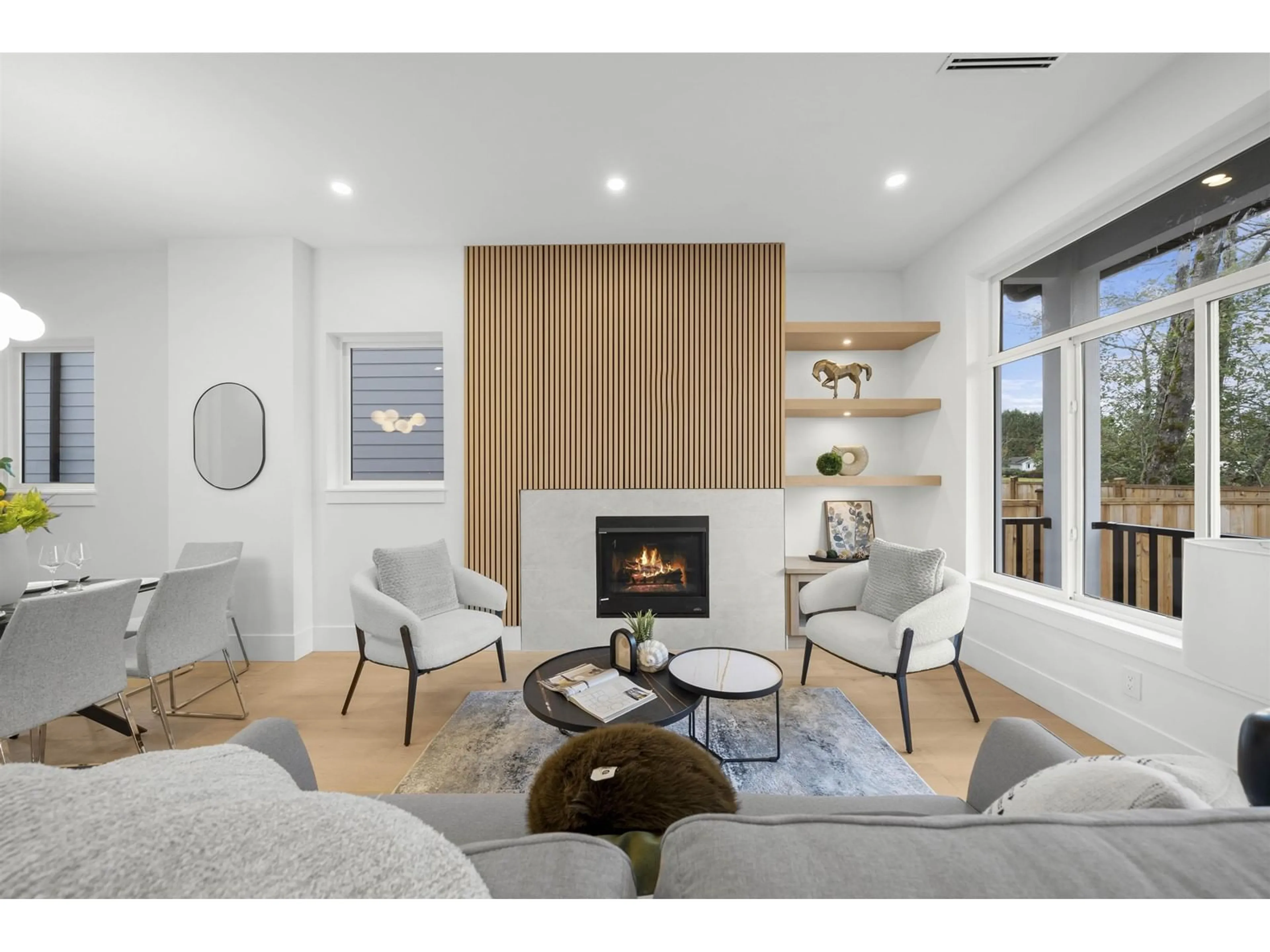 Living room with furniture, wood/laminate floor for 7523 205, Langley British Columbia V2Y3S8