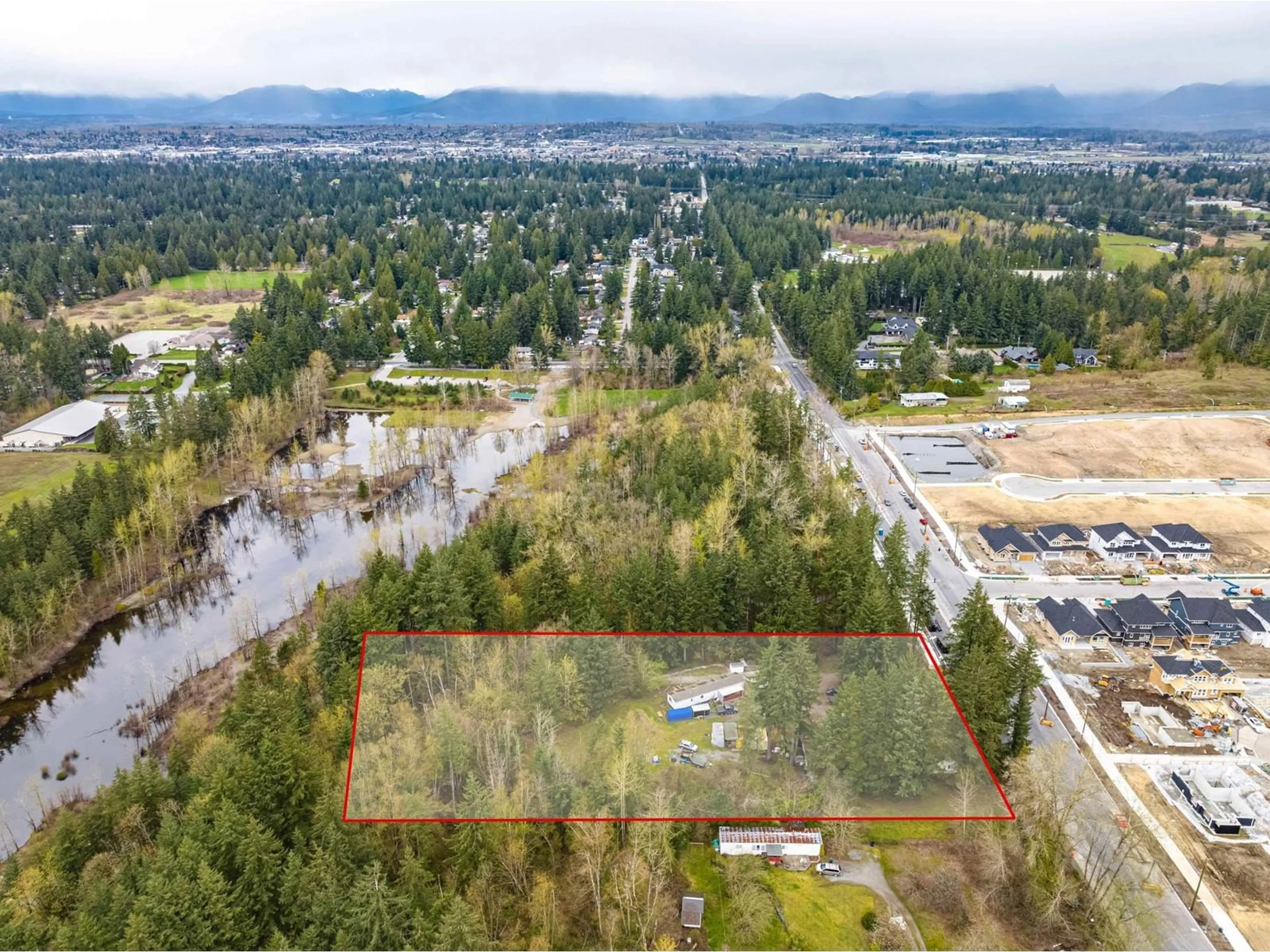 A pic from outside/outdoor area/front of a property/back of a property/a pic from drone, water/lake/river/ocean view for 3381 208, Langley British Columbia V2Z2C5
