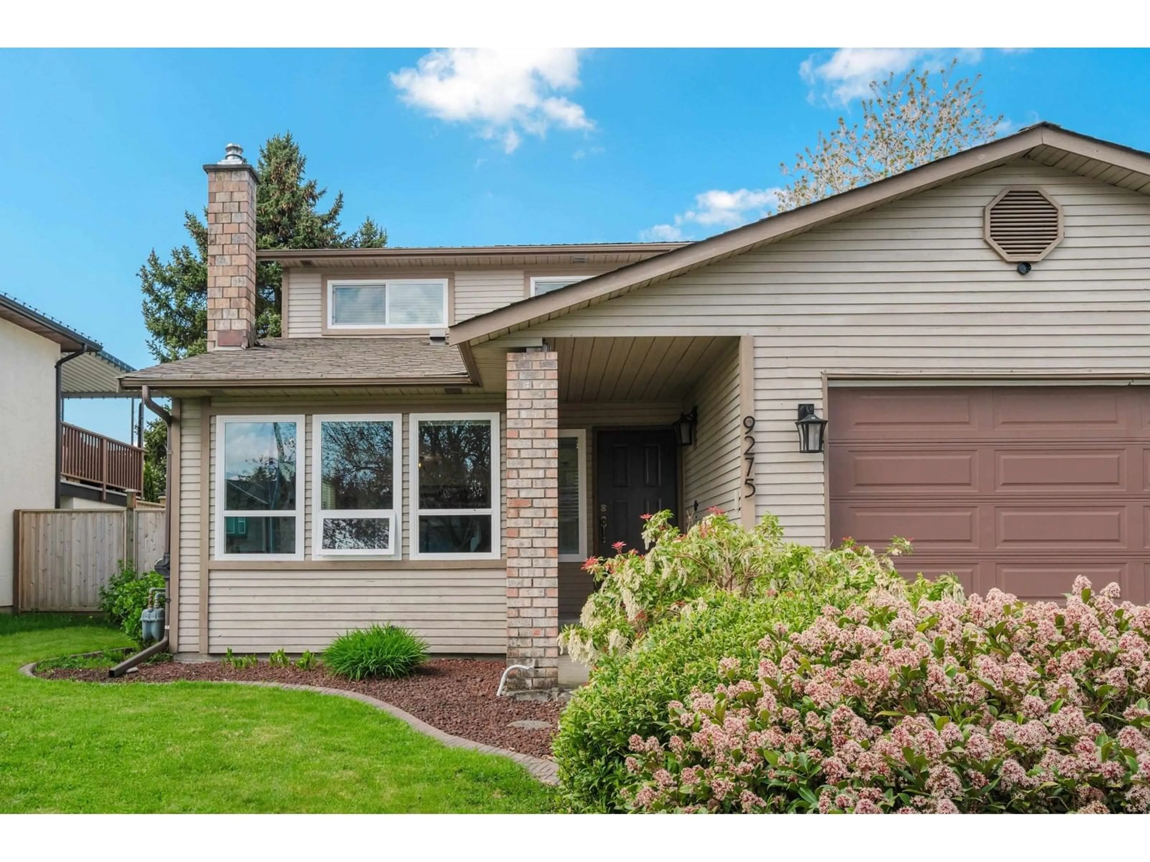Home with vinyl exterior material, street for 9275 212B, Langley British Columbia V1M1K9