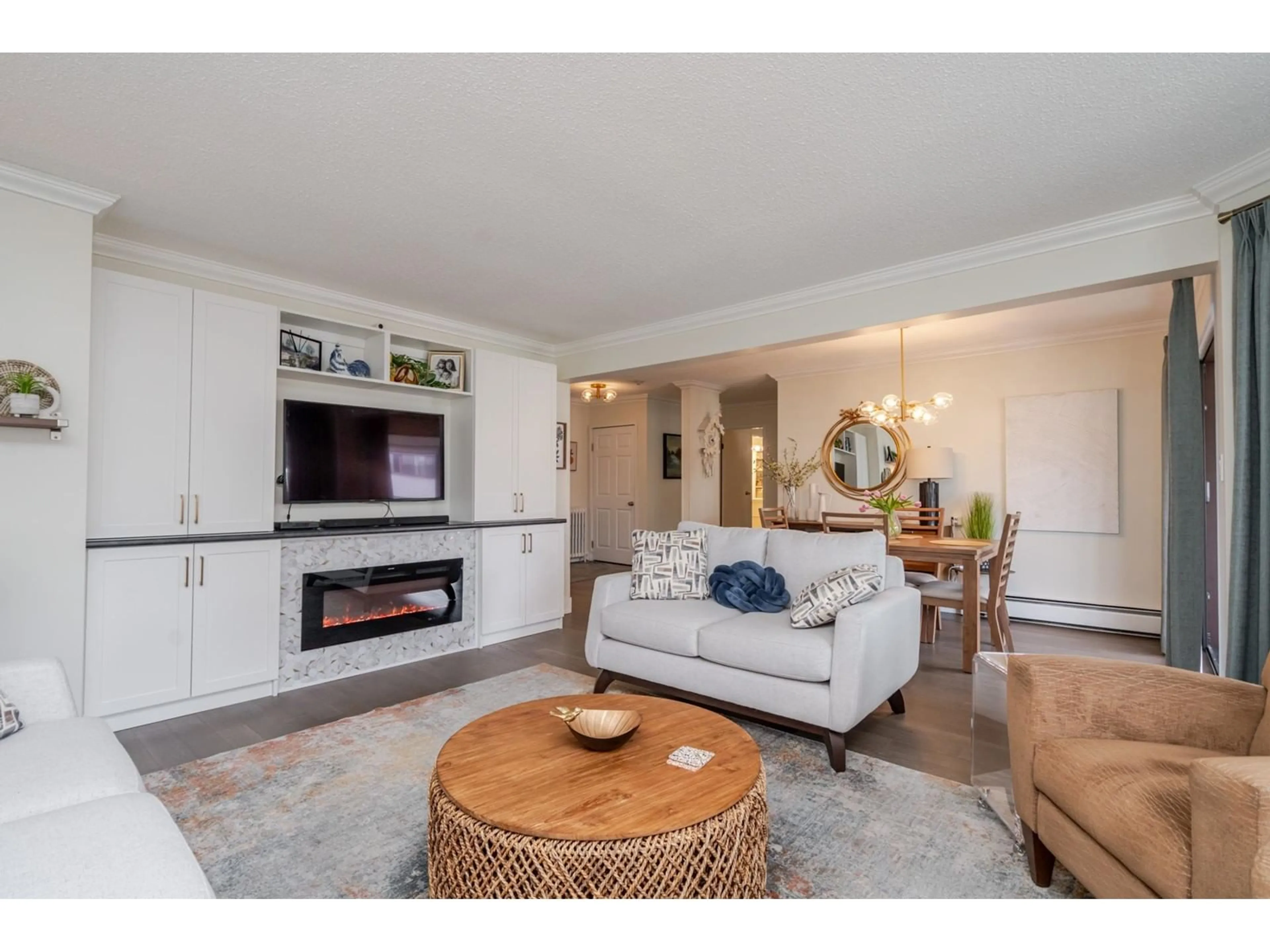 Living room with furniture, wood/laminate floor for 303 - 1449 MERKLIN, White Rock British Columbia V4B4C4