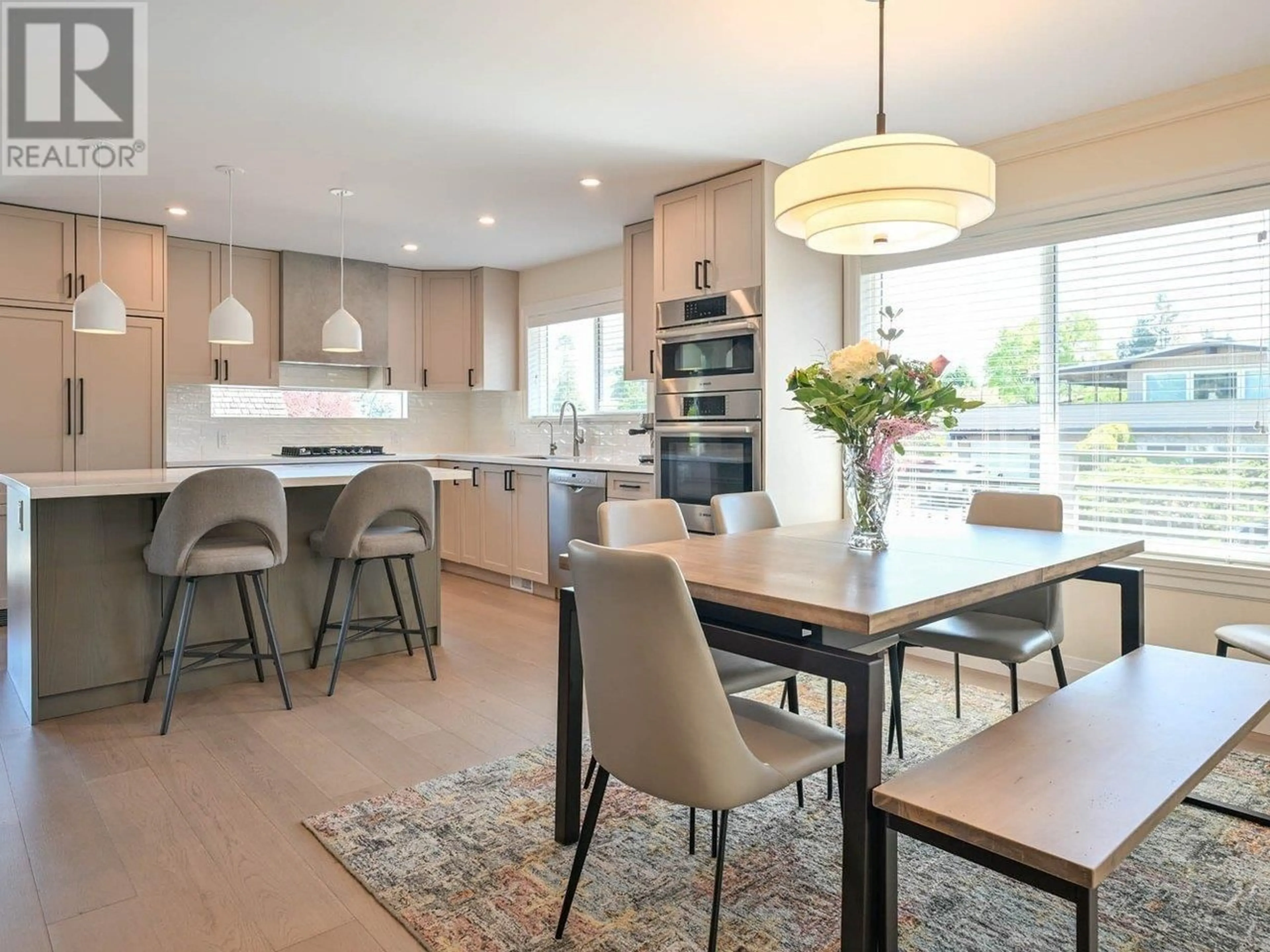 Open concept kitchen, wood/laminate floor for 5379 RAWLINS CRESCENT, Delta British Columbia V4M1J2