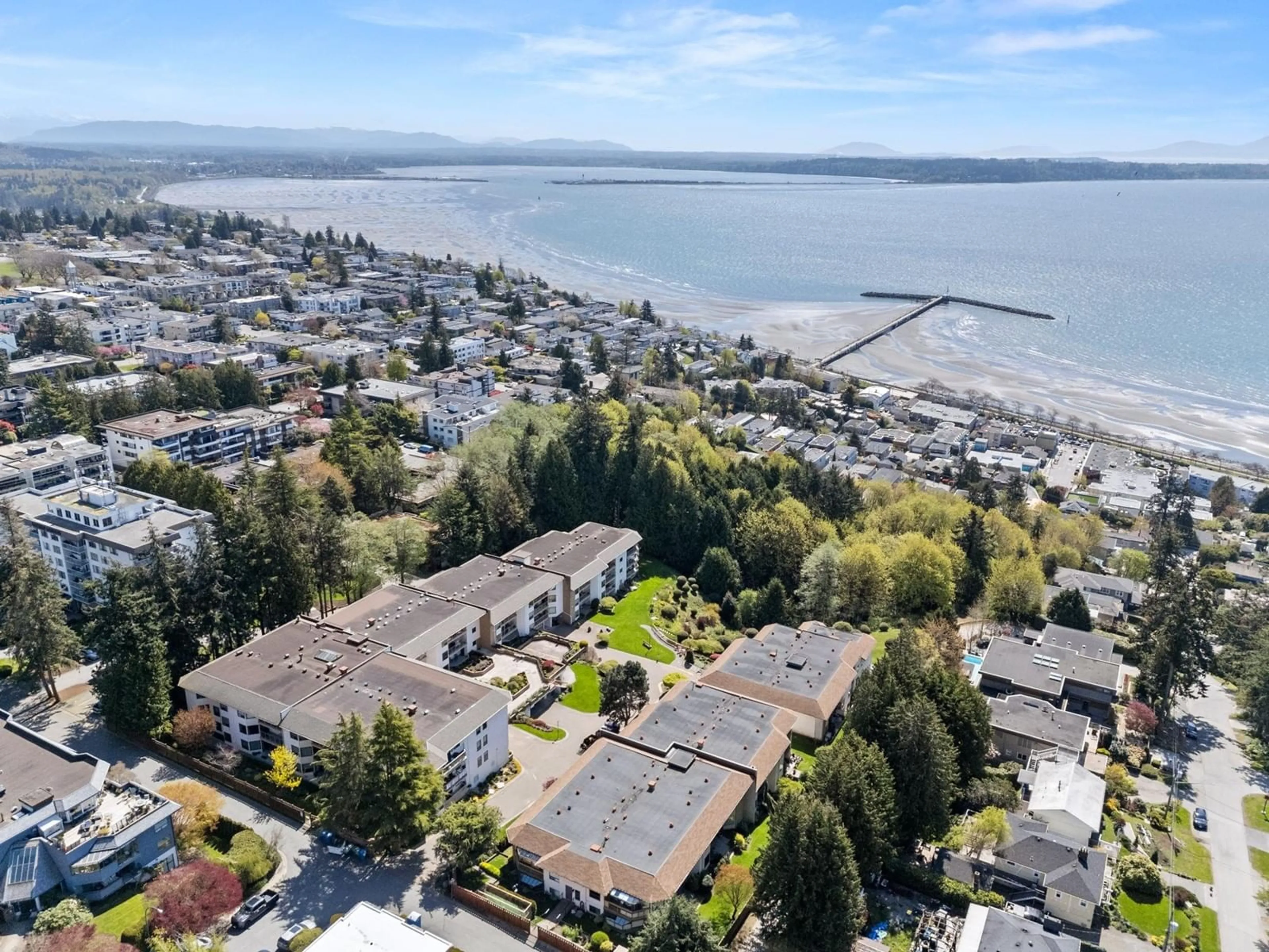 A pic from outside/outdoor area/front of a property/back of a property/a pic from drone, water/lake/river/ocean view for 410 - 1350 VIDAL, Surrey British Columbia V4B5G6