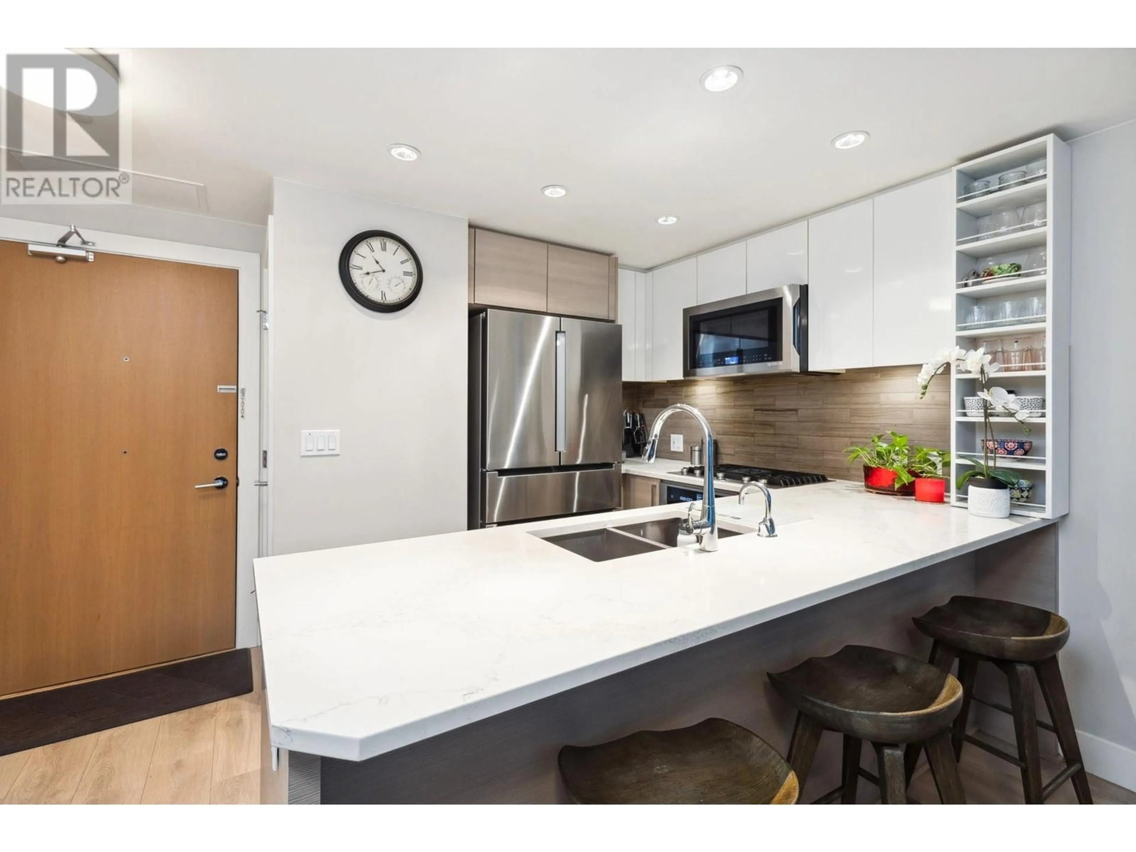 Contemporary kitchen, unknown for 311 - 3451 SAWMILL CRESCENT, Vancouver British Columbia V5S0H3