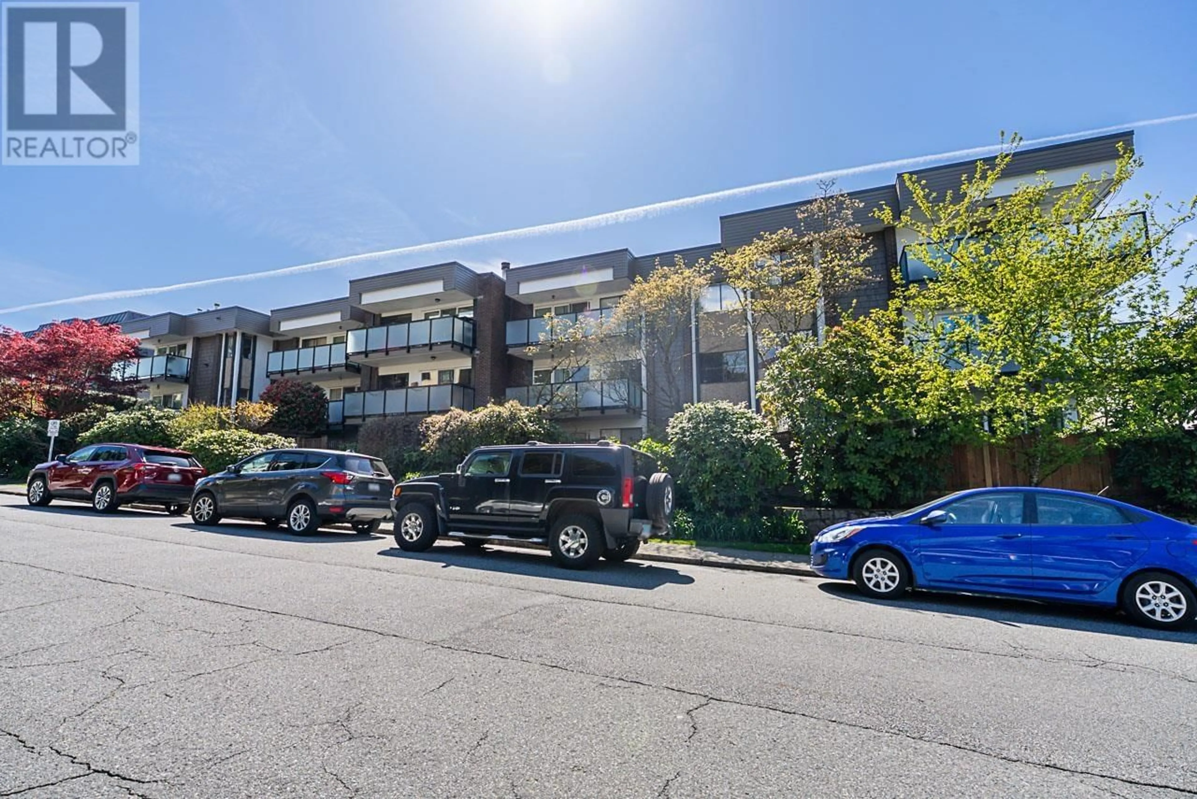 A pic from outside/outdoor area/front of a property/back of a property/a pic from drone, street for 110 - 141 18TH STREET, North Vancouver British Columbia V7L2X3