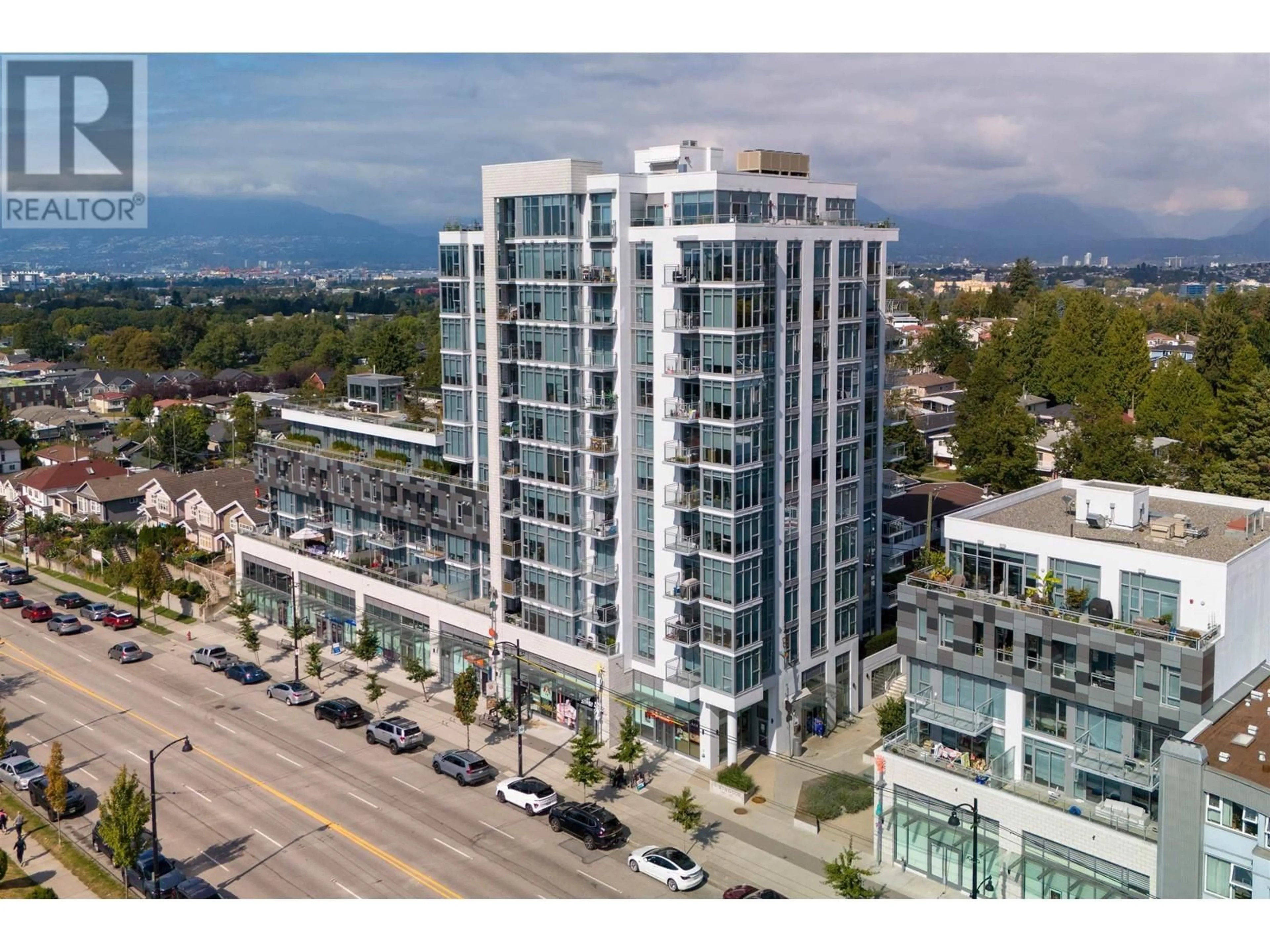 A pic from outside/outdoor area/front of a property/back of a property/a pic from drone, unknown for 408 - 2435 KINGSWAY, Vancouver British Columbia V5R5G8