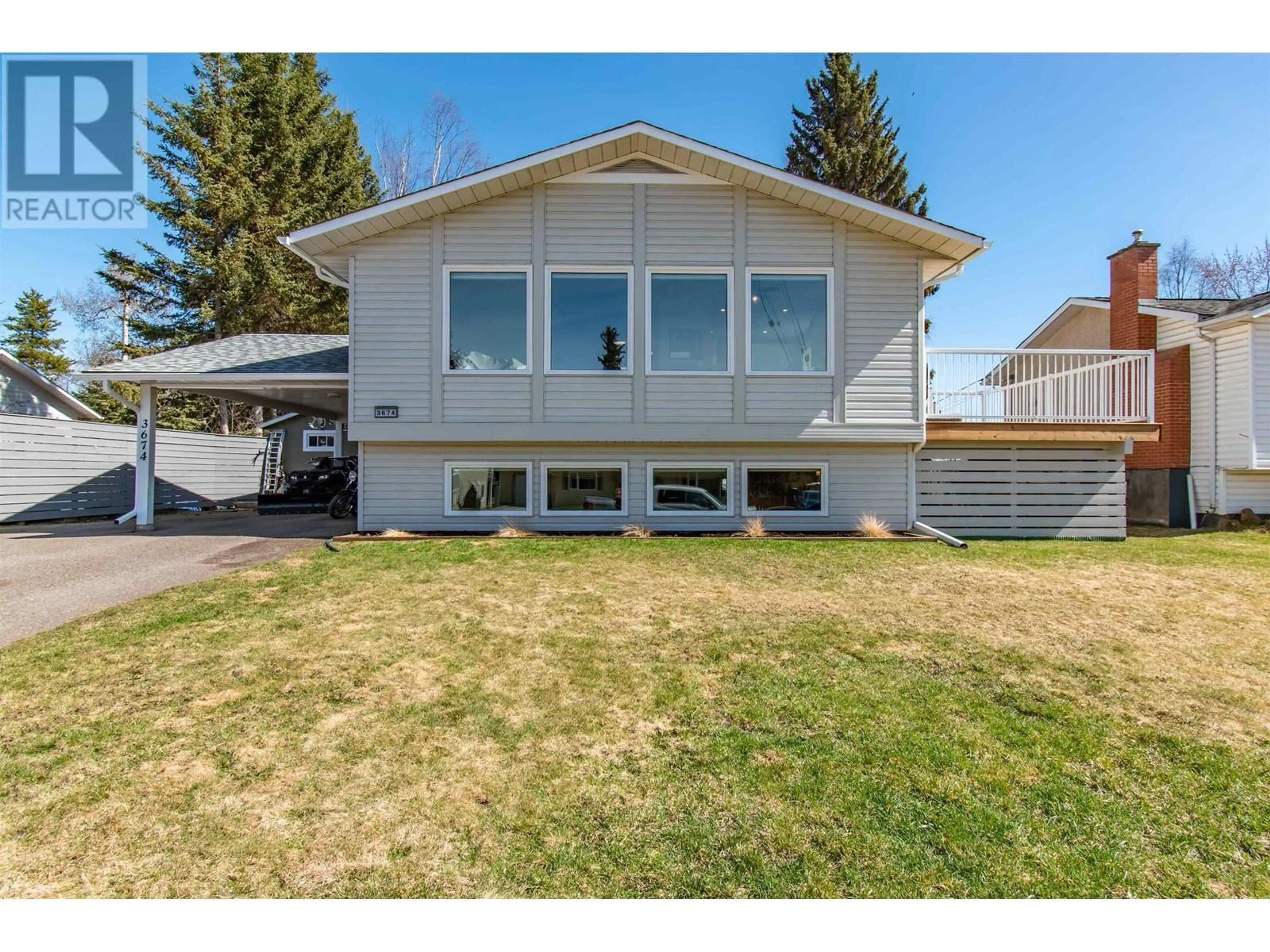 Home with vinyl exterior material, unknown for 3674 16TH AVENUE, Smithers British Columbia V0J2N0