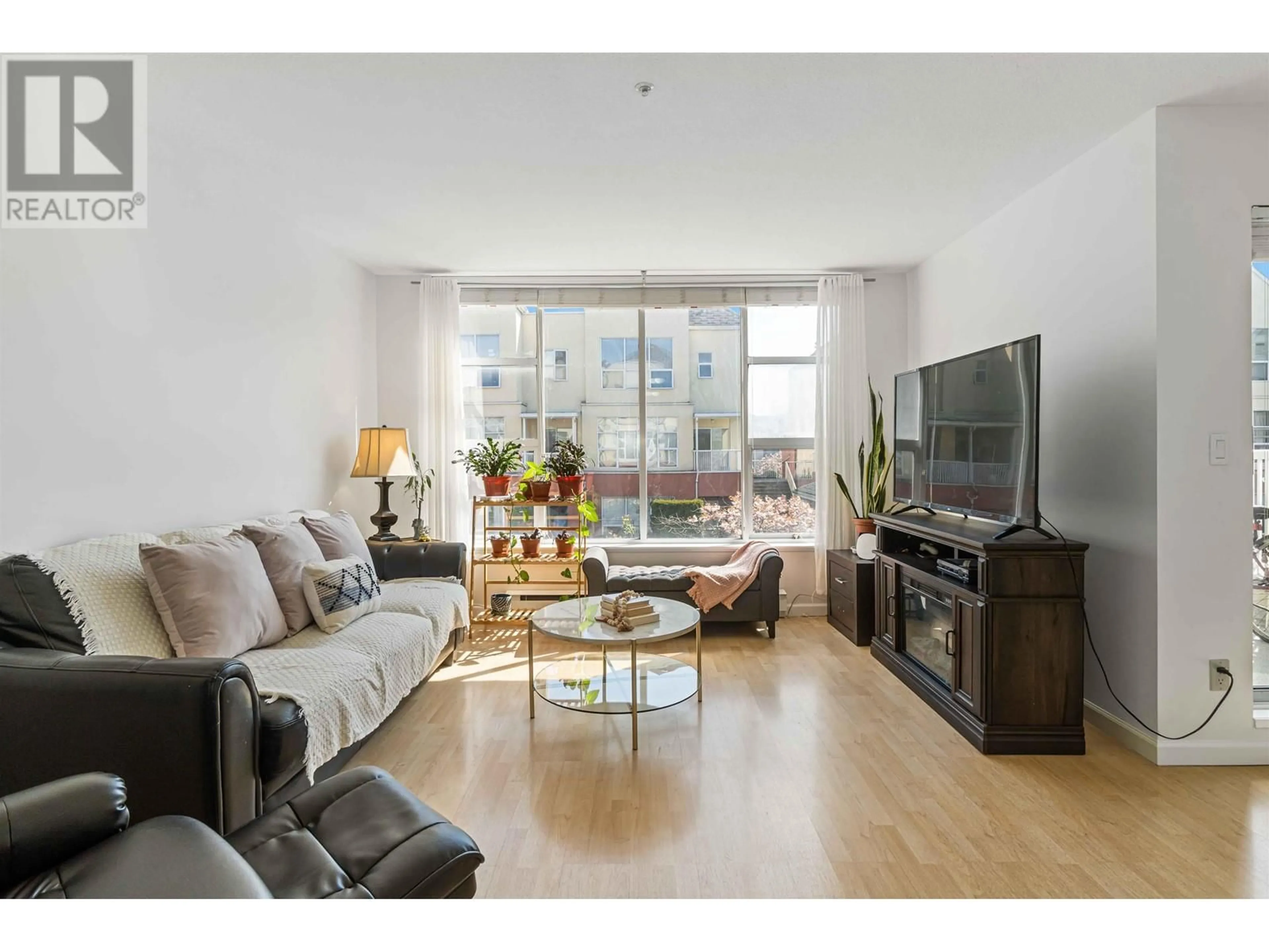 Living room with furniture, wood/laminate floor for 378 - 8333 JONES RD ROAD, Richmond British Columbia V6Y3W9