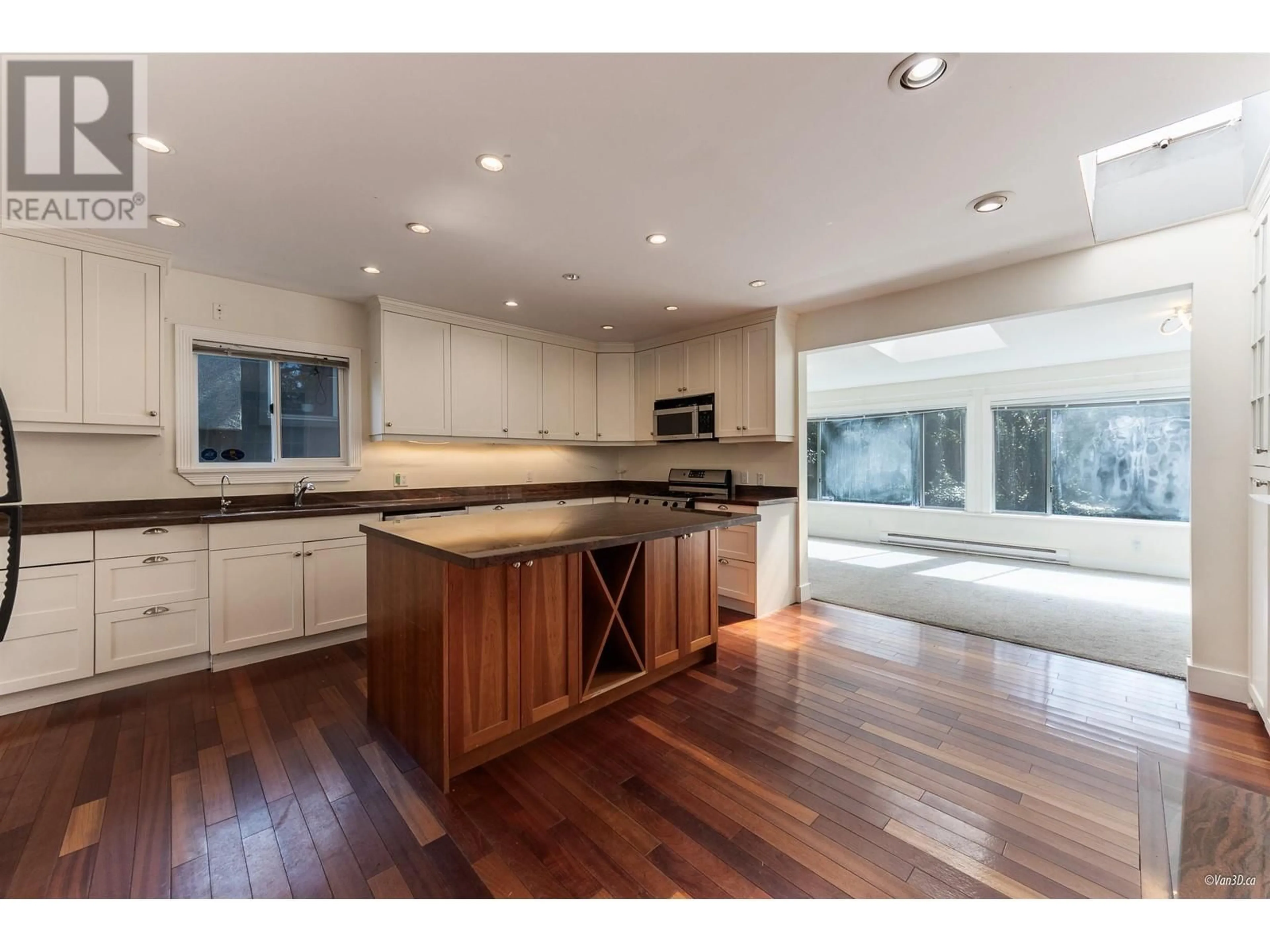 Open concept kitchen, wood/laminate floor for 2146 33RD AVENUE, Vancouver British Columbia V6M1B9