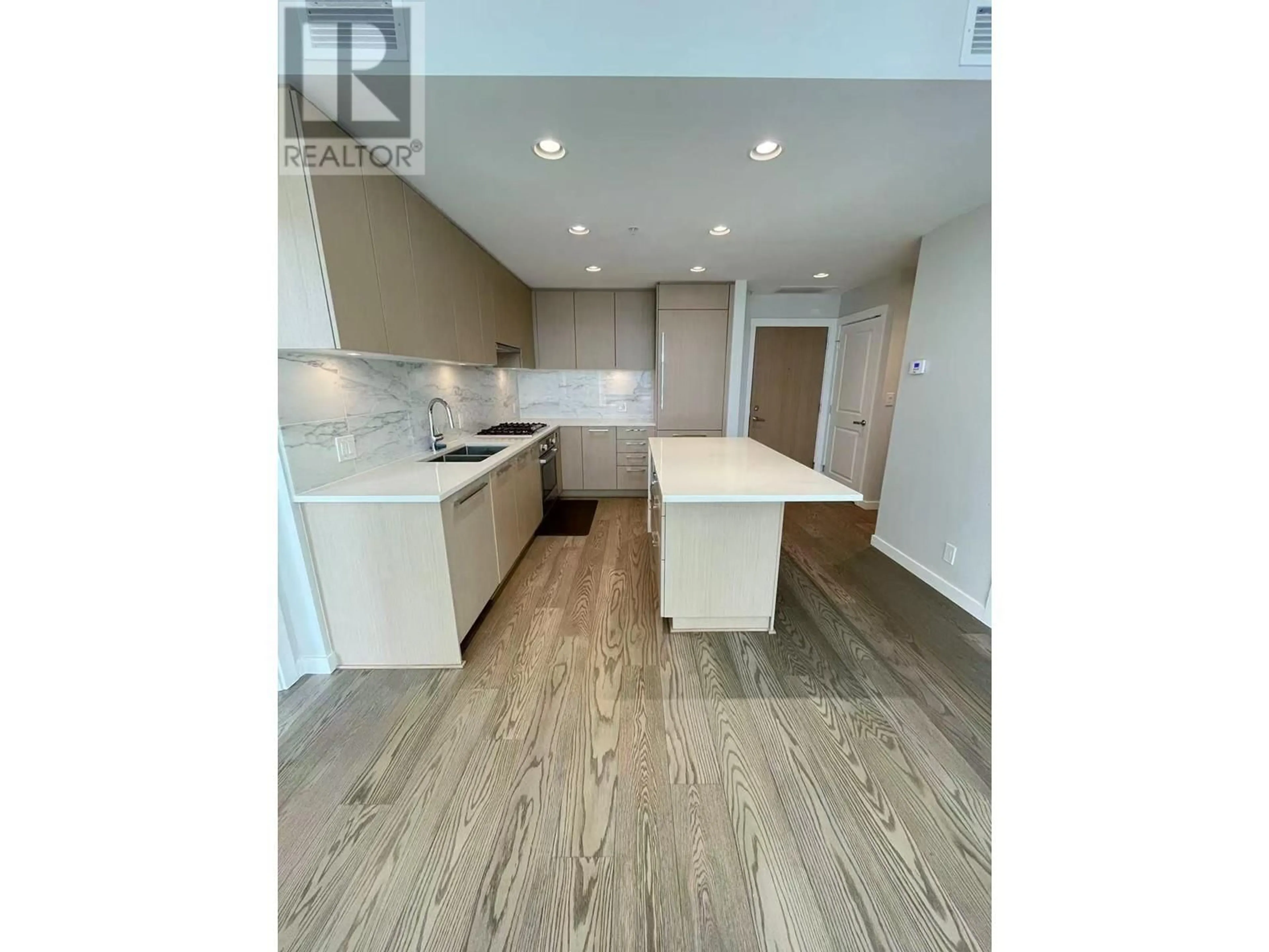 Open concept kitchen, wood/laminate floor for 632 - 3563 ROSS DRIVE, Vancouver British Columbia V6S0L3