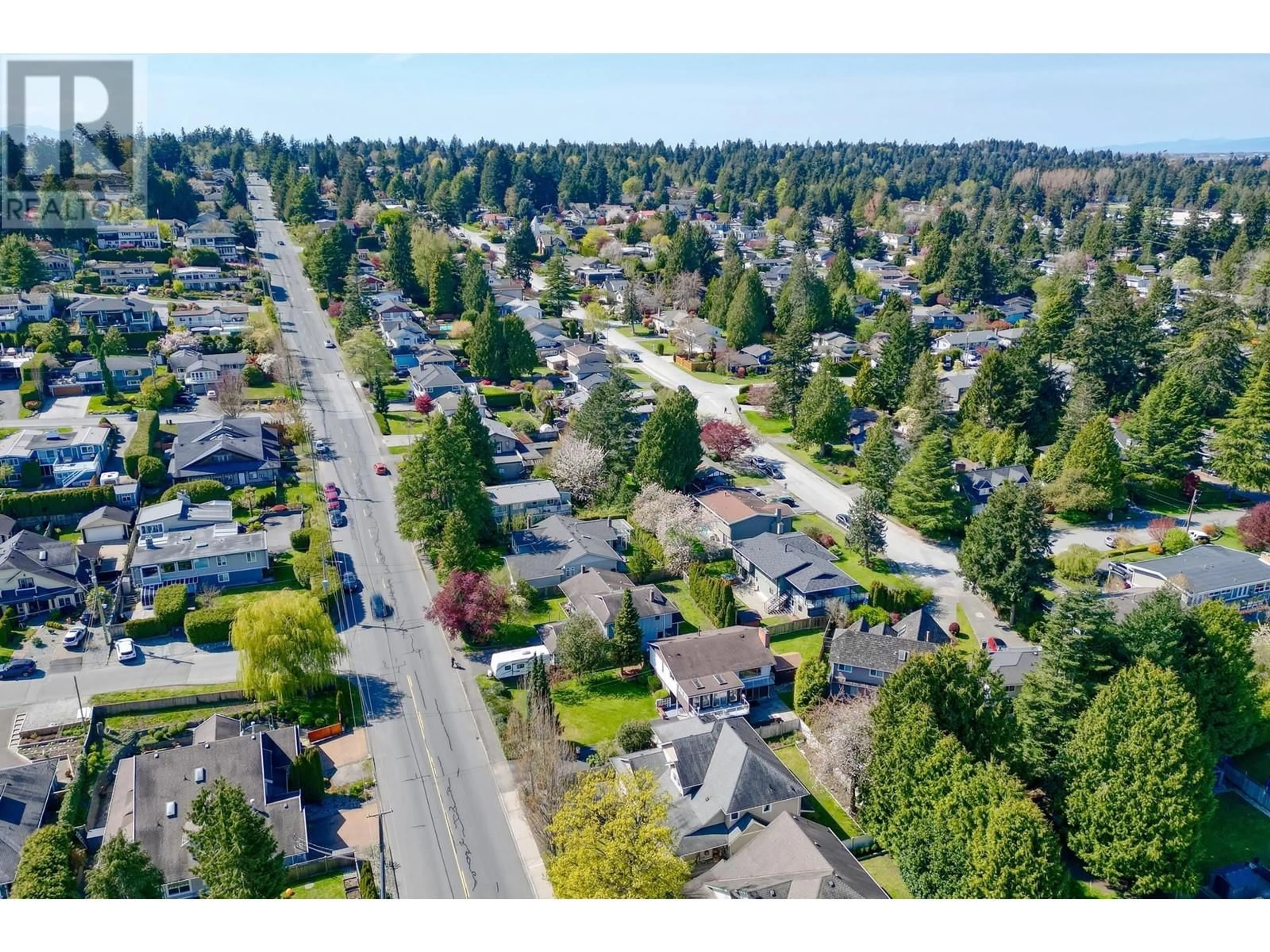 A pic from outside/outdoor area/front of a property/back of a property/a pic from drone, street for 5551 4 AVENUE, Delta British Columbia V4M1H2