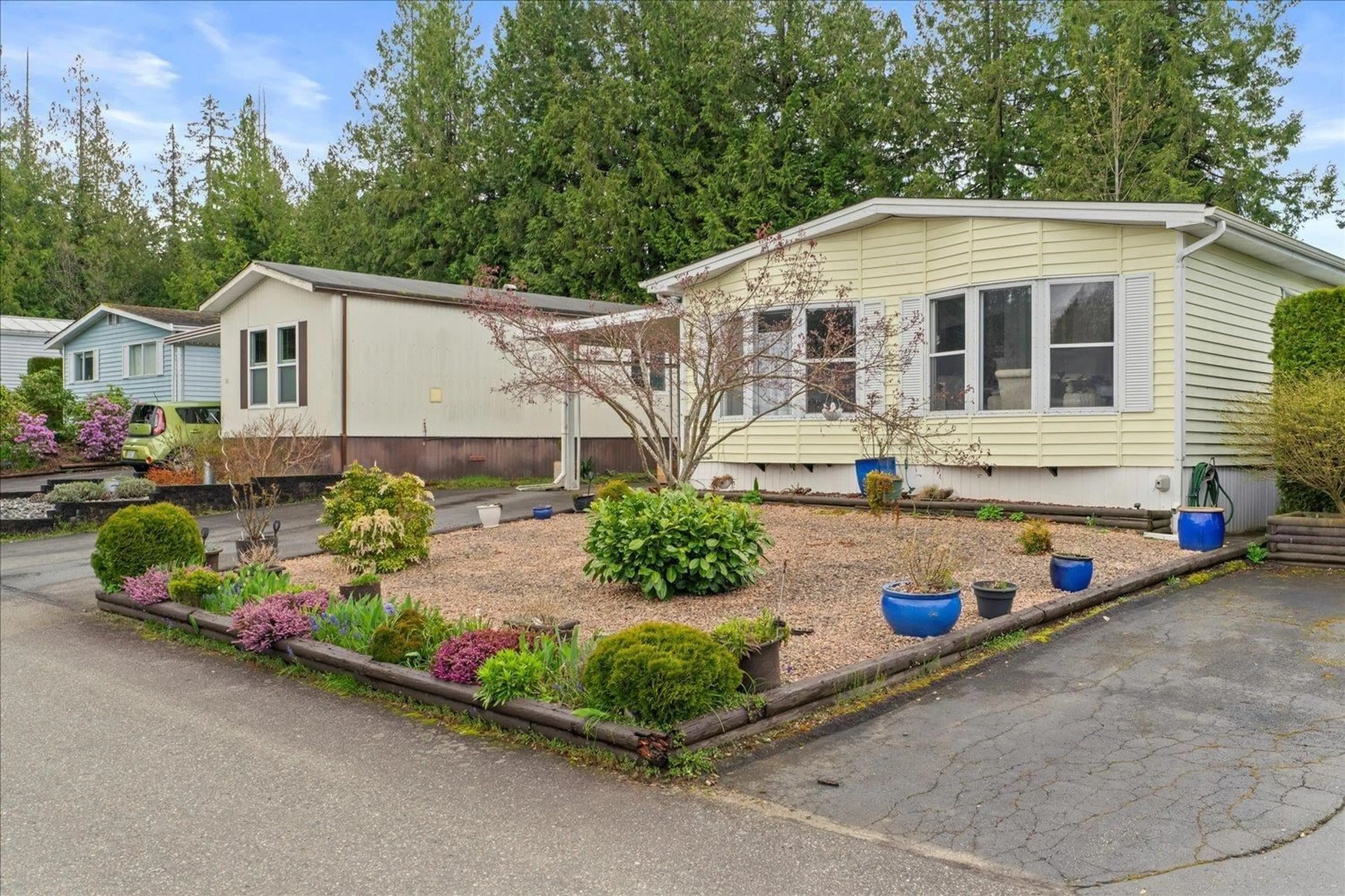 Home with vinyl exterior material, street for 32 - 2315 198, Langley British Columbia V2Z1Z1