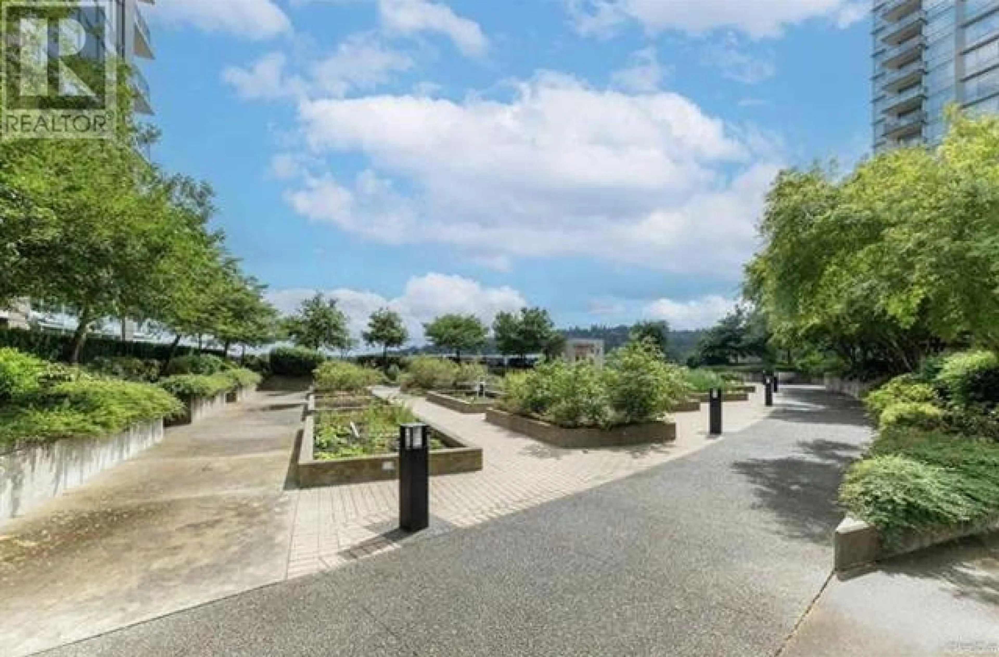 A pic from outside/outdoor area/front of a property/back of a property/a pic from drone, street for 305 - 2968 GLEN DRIVE, Coquitlam British Columbia V3B0C4