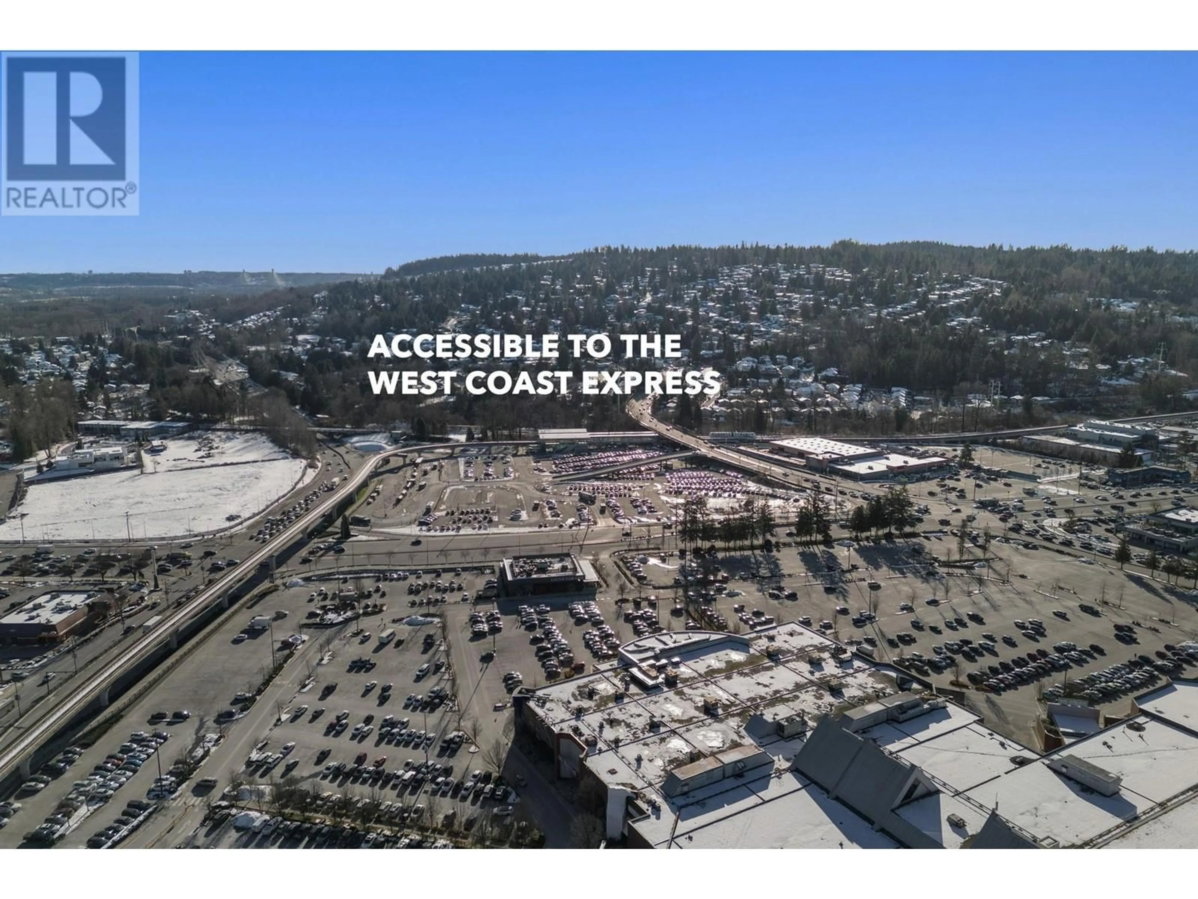A pic from outside/outdoor area/front of a property/back of a property/a pic from drone, street for 305 - 2968 GLEN DRIVE, Coquitlam British Columbia V3B0C4