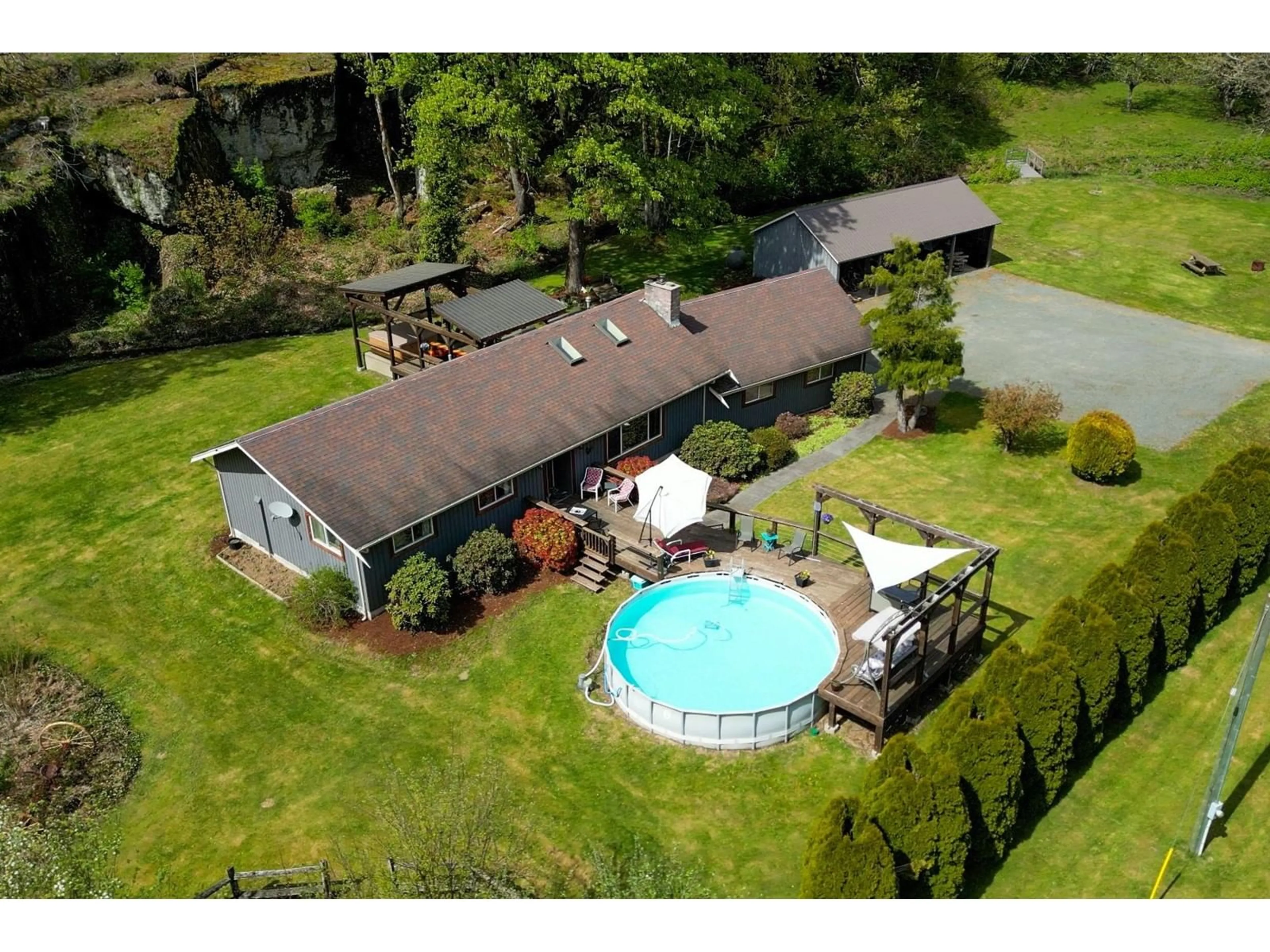 A pic from outside/outdoor area/front of a property/back of a property/a pic from drone, unknown for 17530 ARBOR ROAD, Harrison Mills British Columbia V0M1A1
