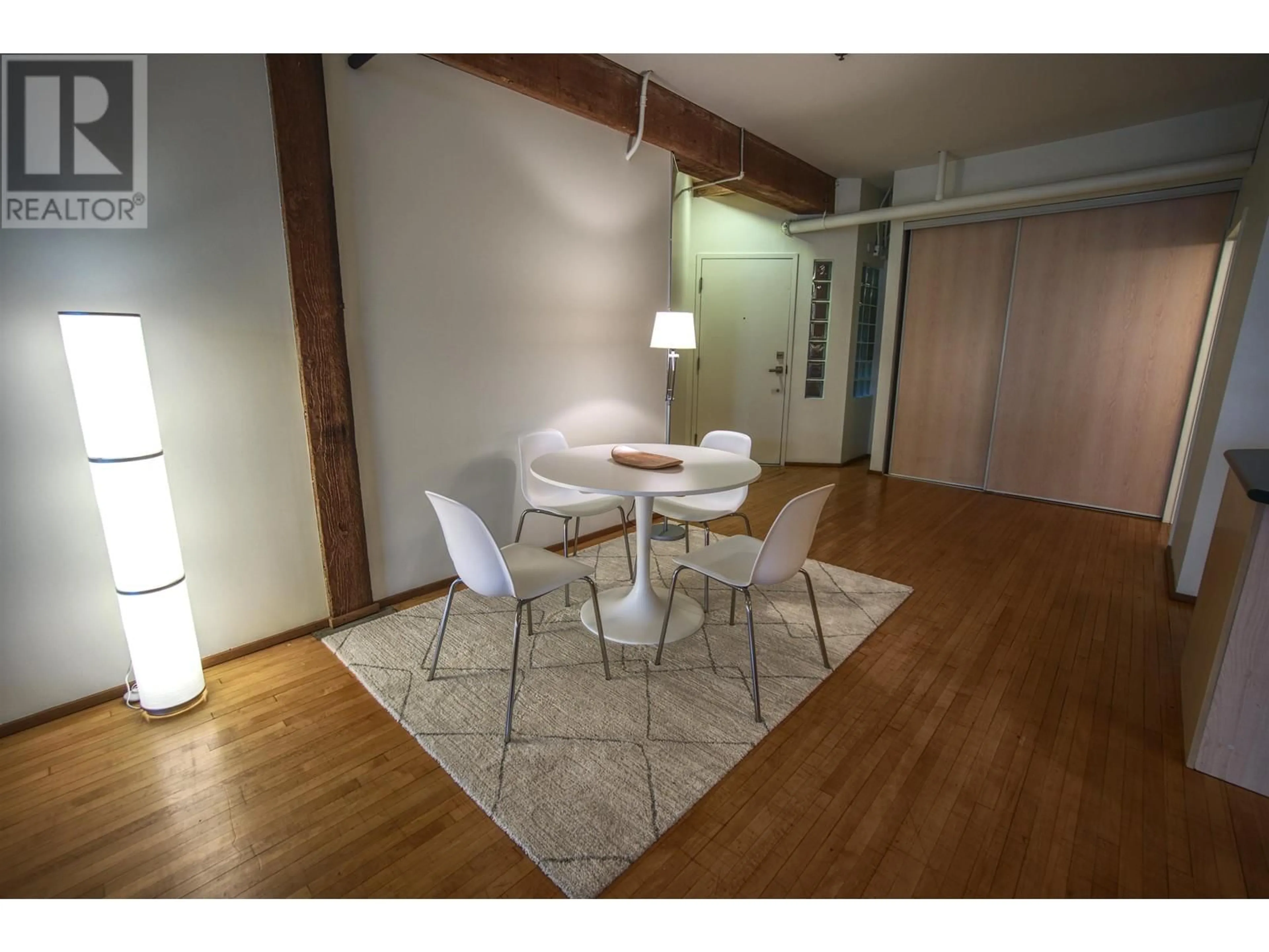 Dining room, wood/laminate floor for 201 - 2556 HASTINGS STREET, Vancouver British Columbia V5K1Z3