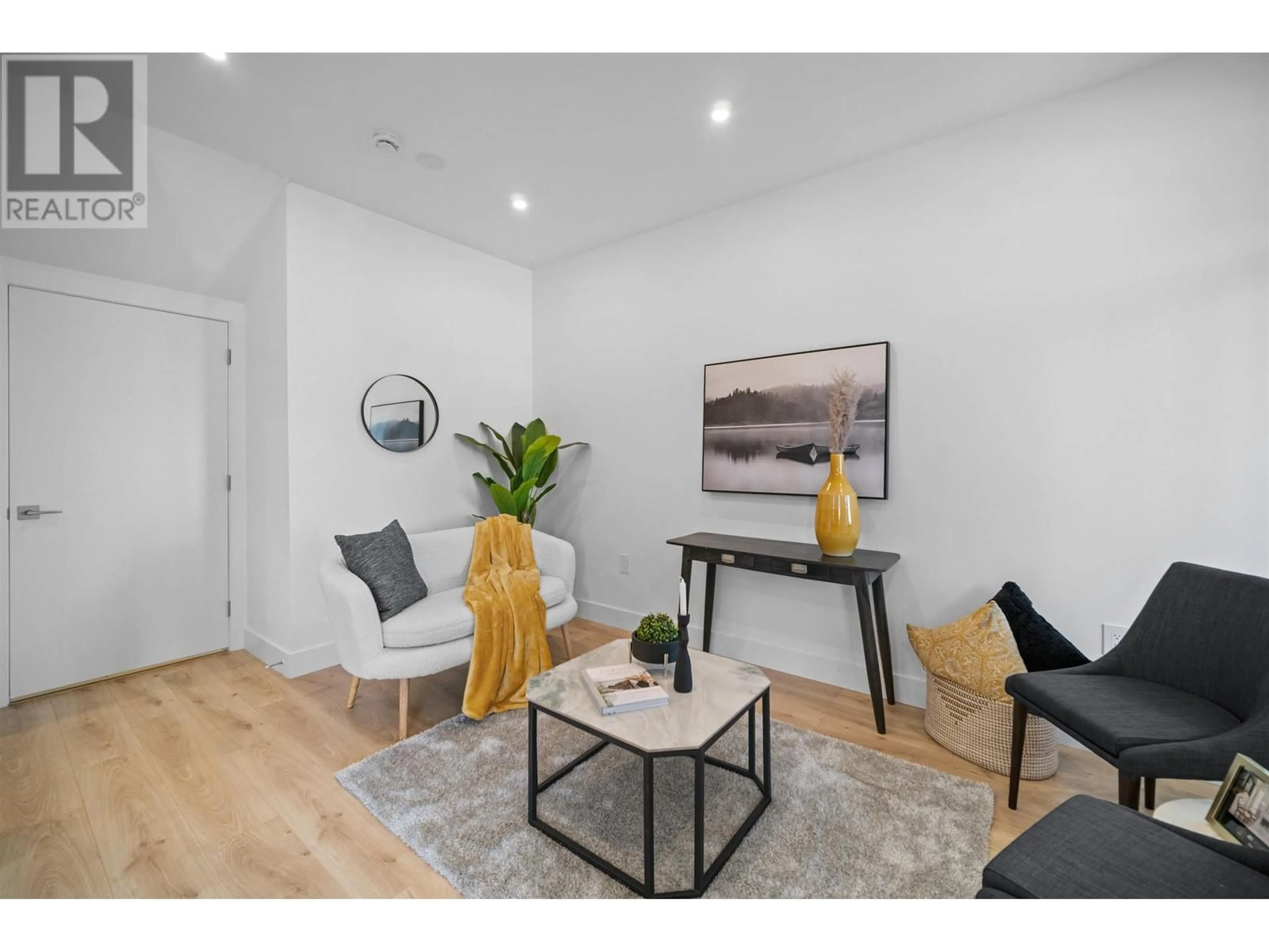 Living room with furniture, wood/laminate floor for 1 - 3644 28TH AVENUE, Vancouver British Columbia V5R1T7
