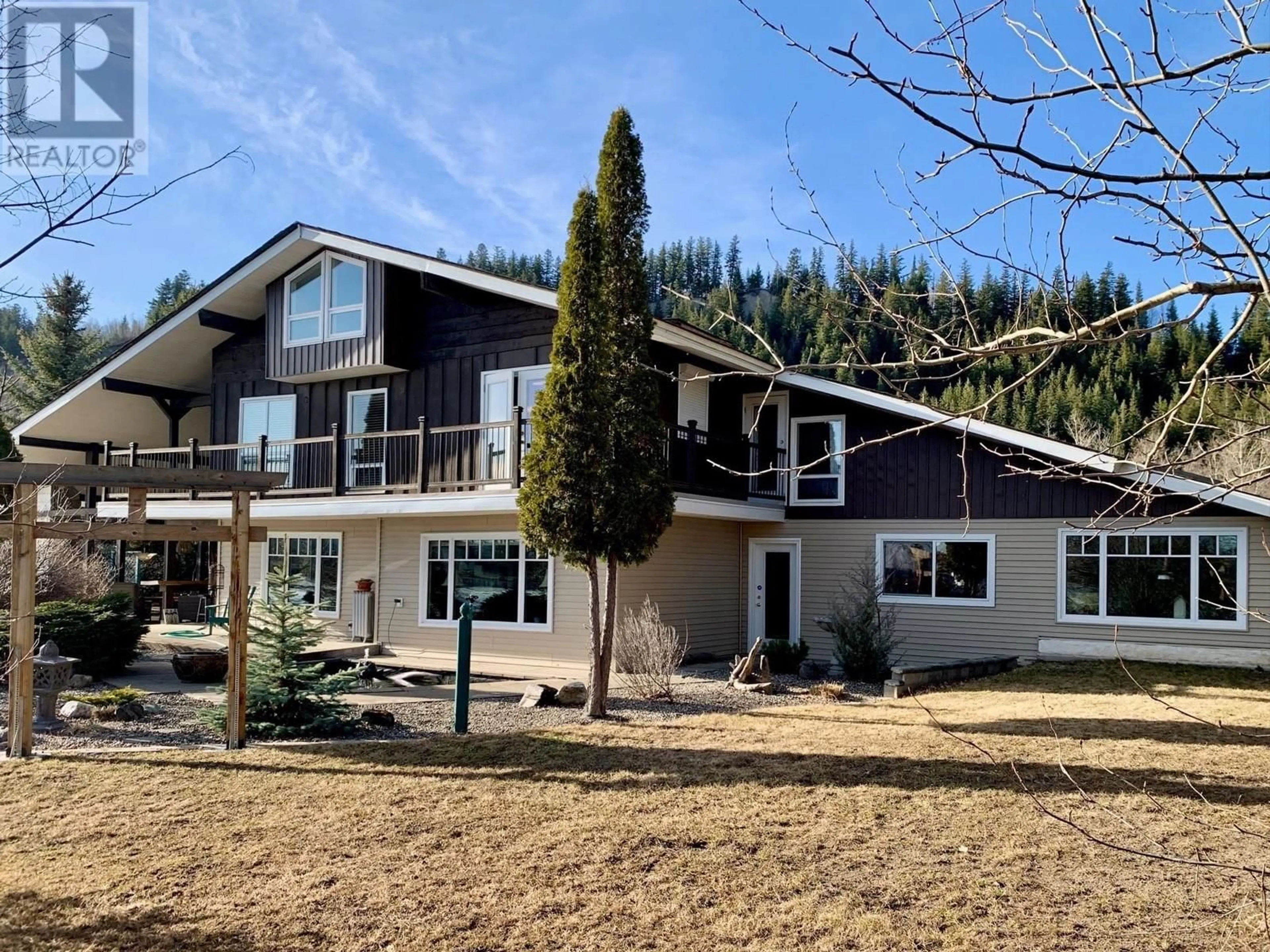 A pic from outside/outdoor area/front of a property/back of a property/a pic from drone, mountain view for 829 PG PULPMILL ROAD, Prince George British Columbia V2K5P4