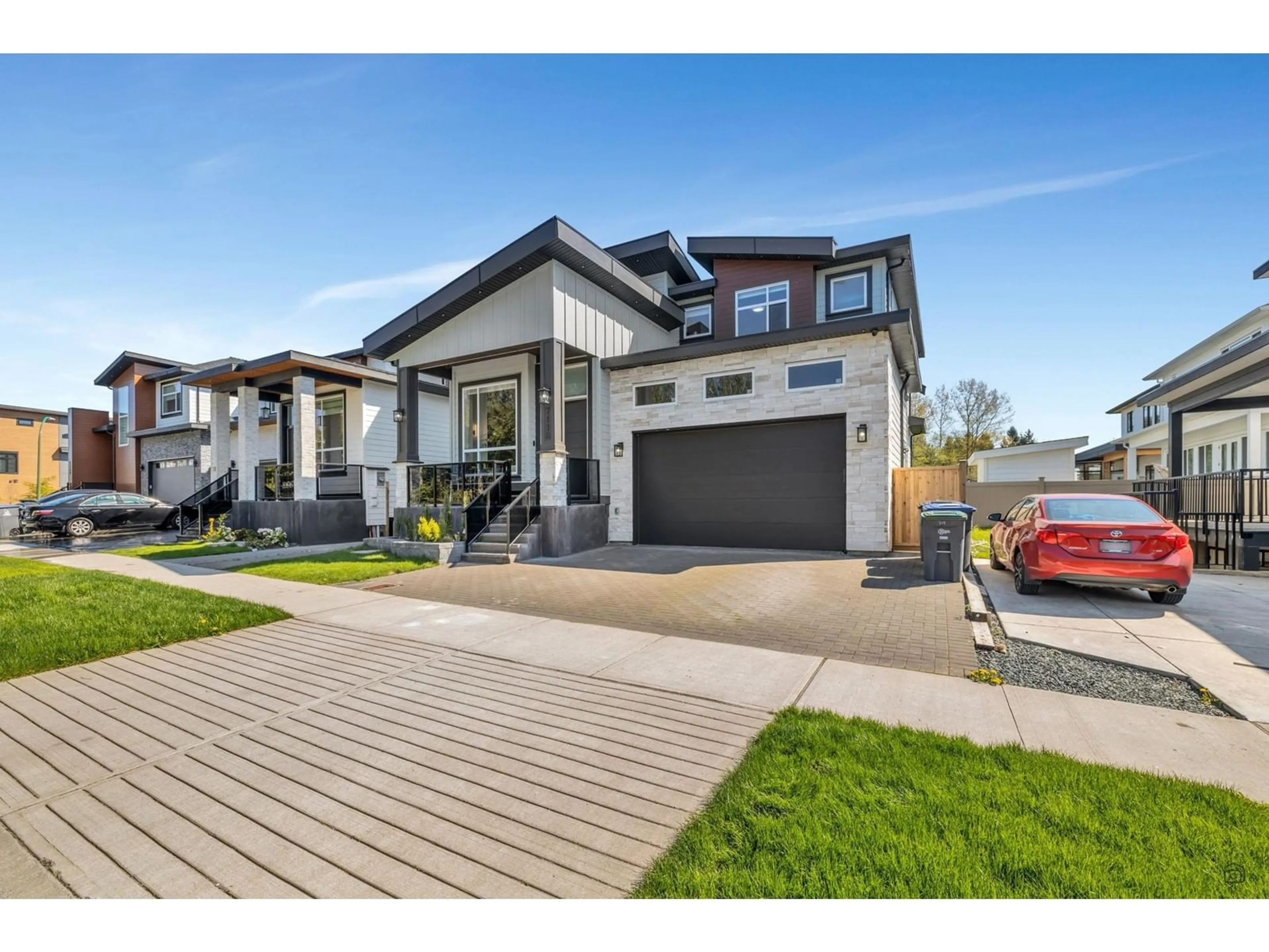 Home with vinyl exterior material, street for 7118 FISHER, Surrey British Columbia V4N1N2