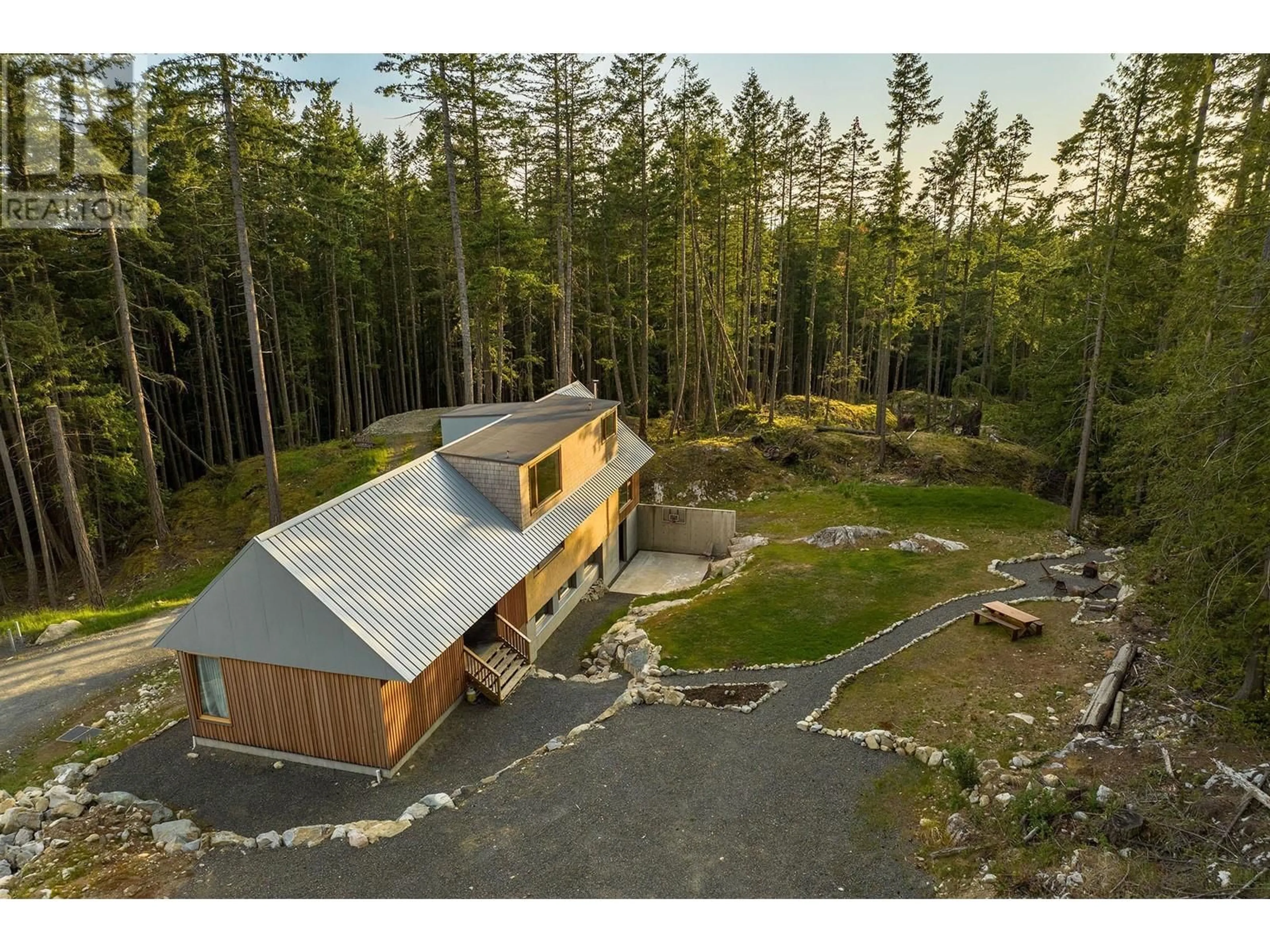 A pic from outside/outdoor area/front of a property/back of a property/a pic from drone, unknown for 1565 DOUGLAS ROAD, Bowen Island British Columbia V0N1G2