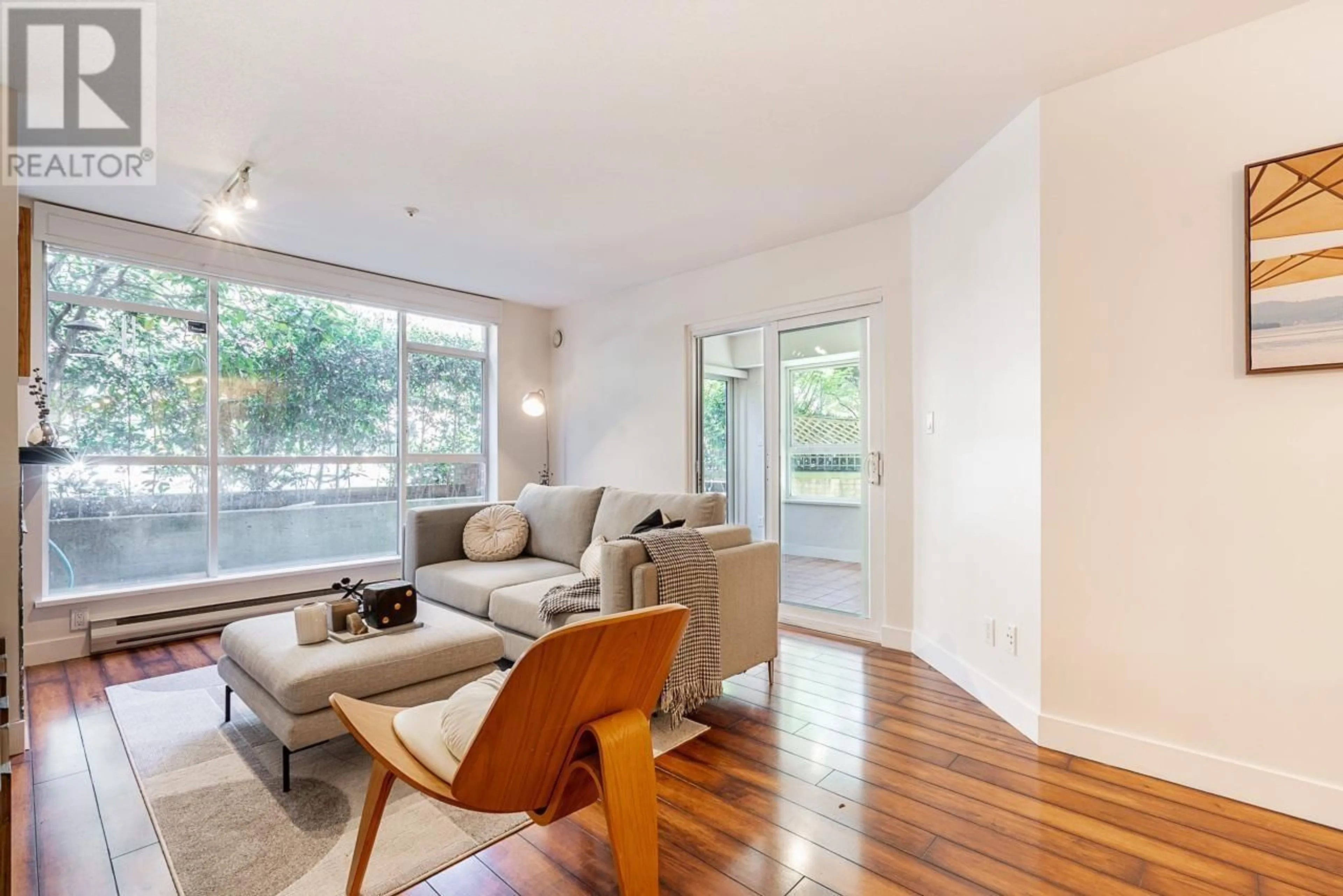 Living room with furniture, wood/laminate floor for 104 - 2268 12TH AVENUE, Vancouver British Columbia V6K2N5