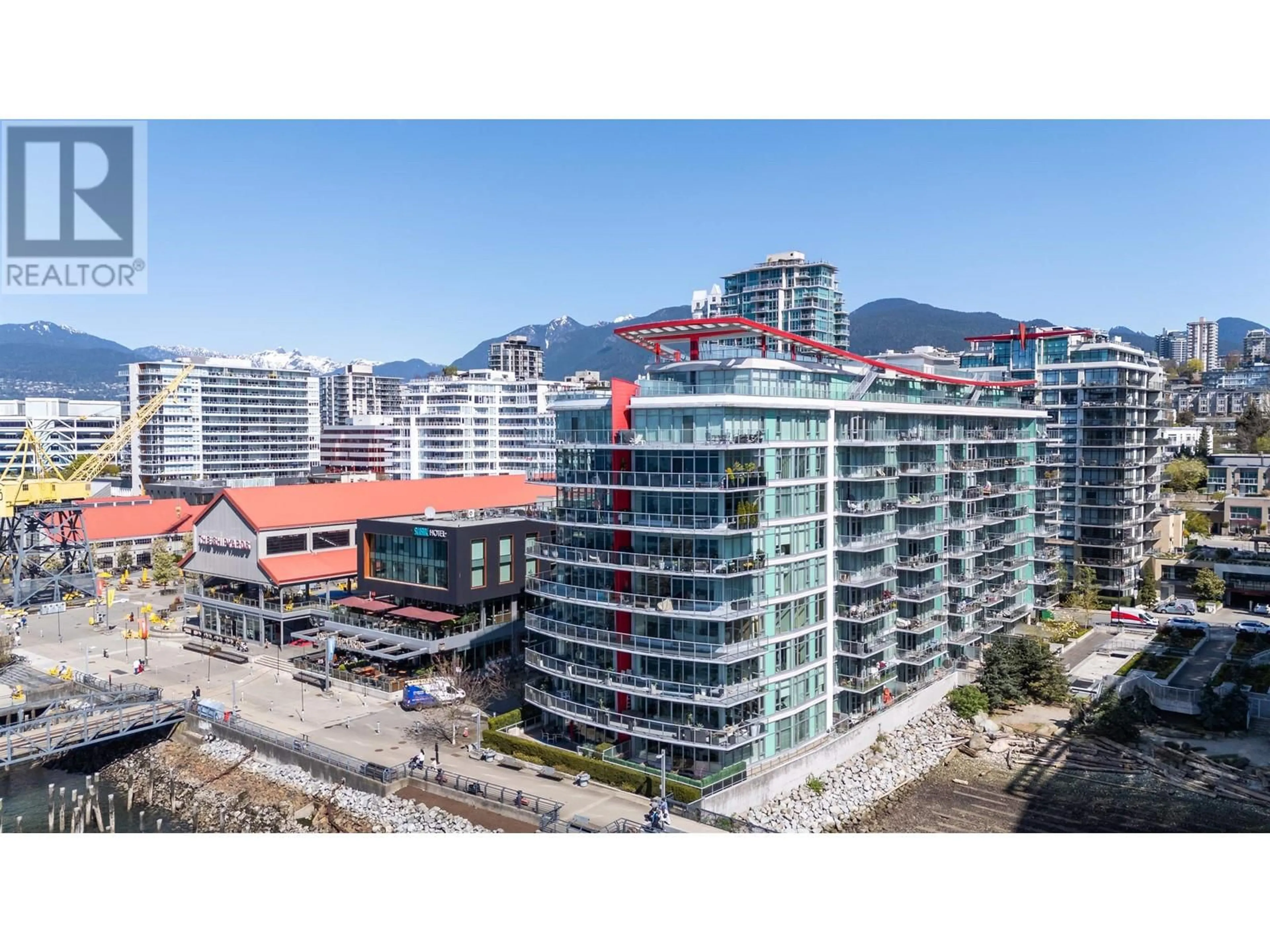 A pic from outside/outdoor area/front of a property/back of a property/a pic from drone, city buildings view from balcony for 608 - 175 VICTORY SHIP WAY, North Vancouver British Columbia V7L0G1