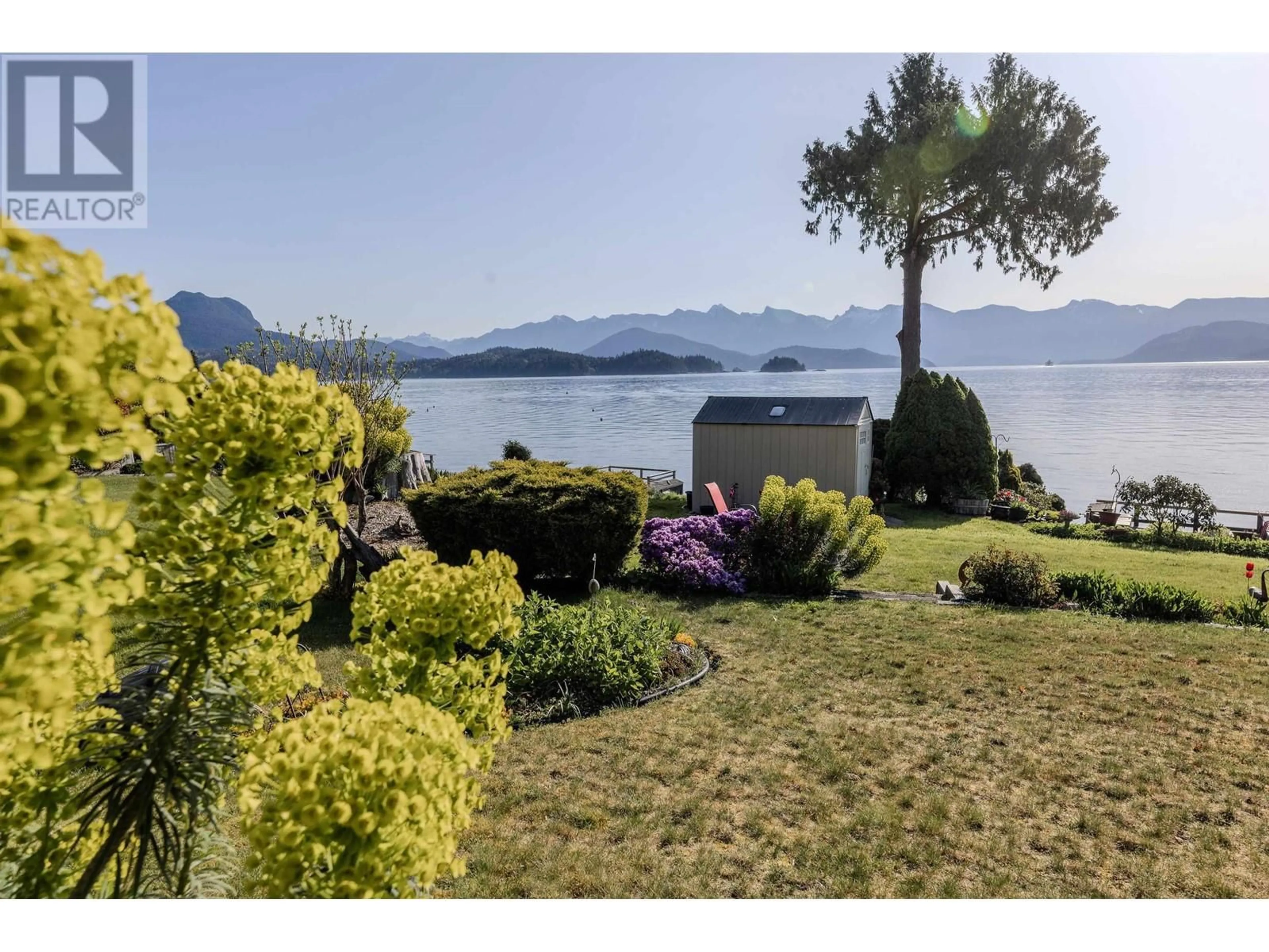 A pic from outside/outdoor area/front of a property/back of a property/a pic from drone, water/lake/river/ocean view for 1162 POINT ROAD, Gibsons British Columbia V0N1V1