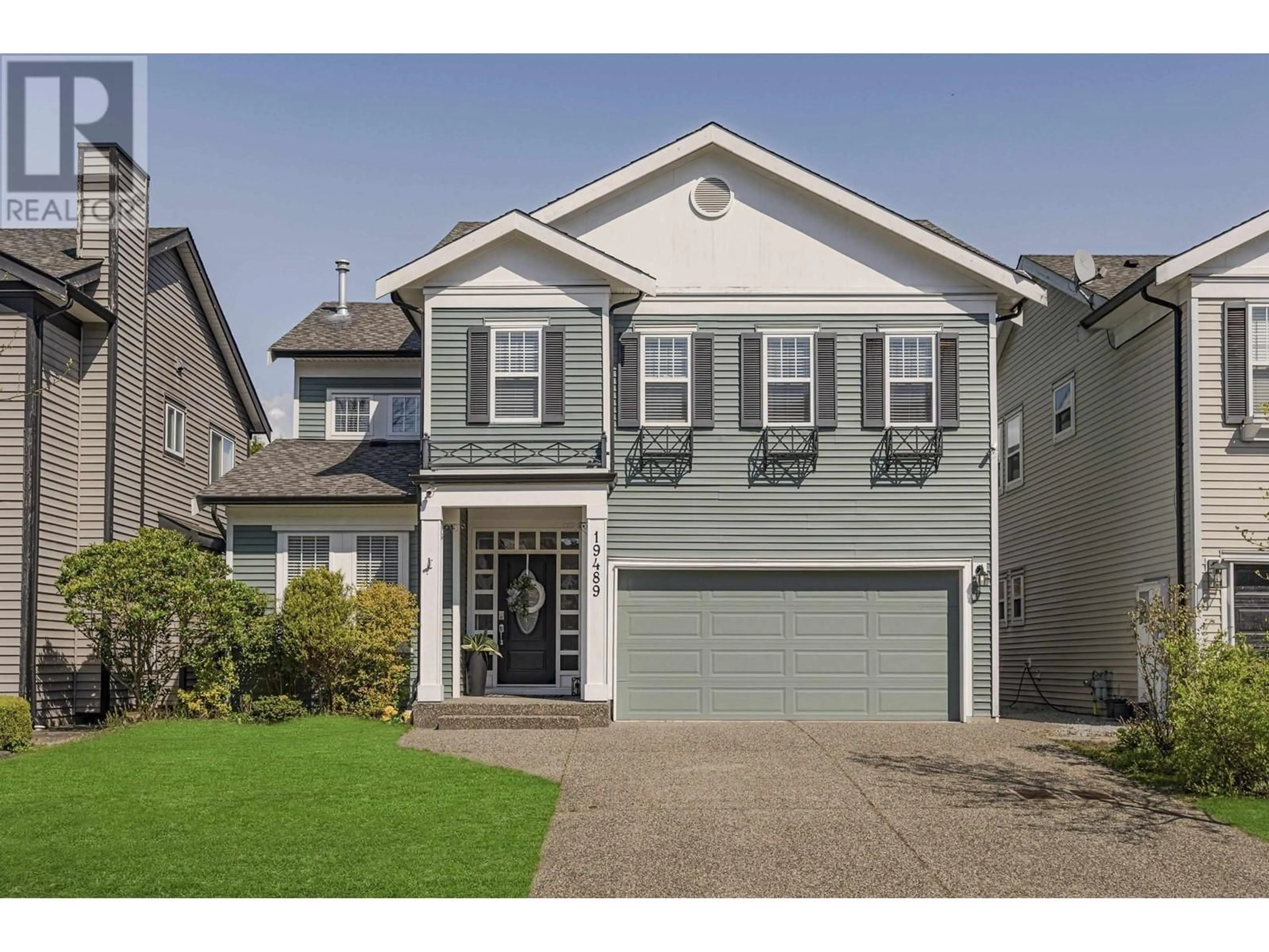 Home with vinyl exterior material, street for 19489 SAWYERS ROAD, Pitt Meadows British Columbia V3Y2W9