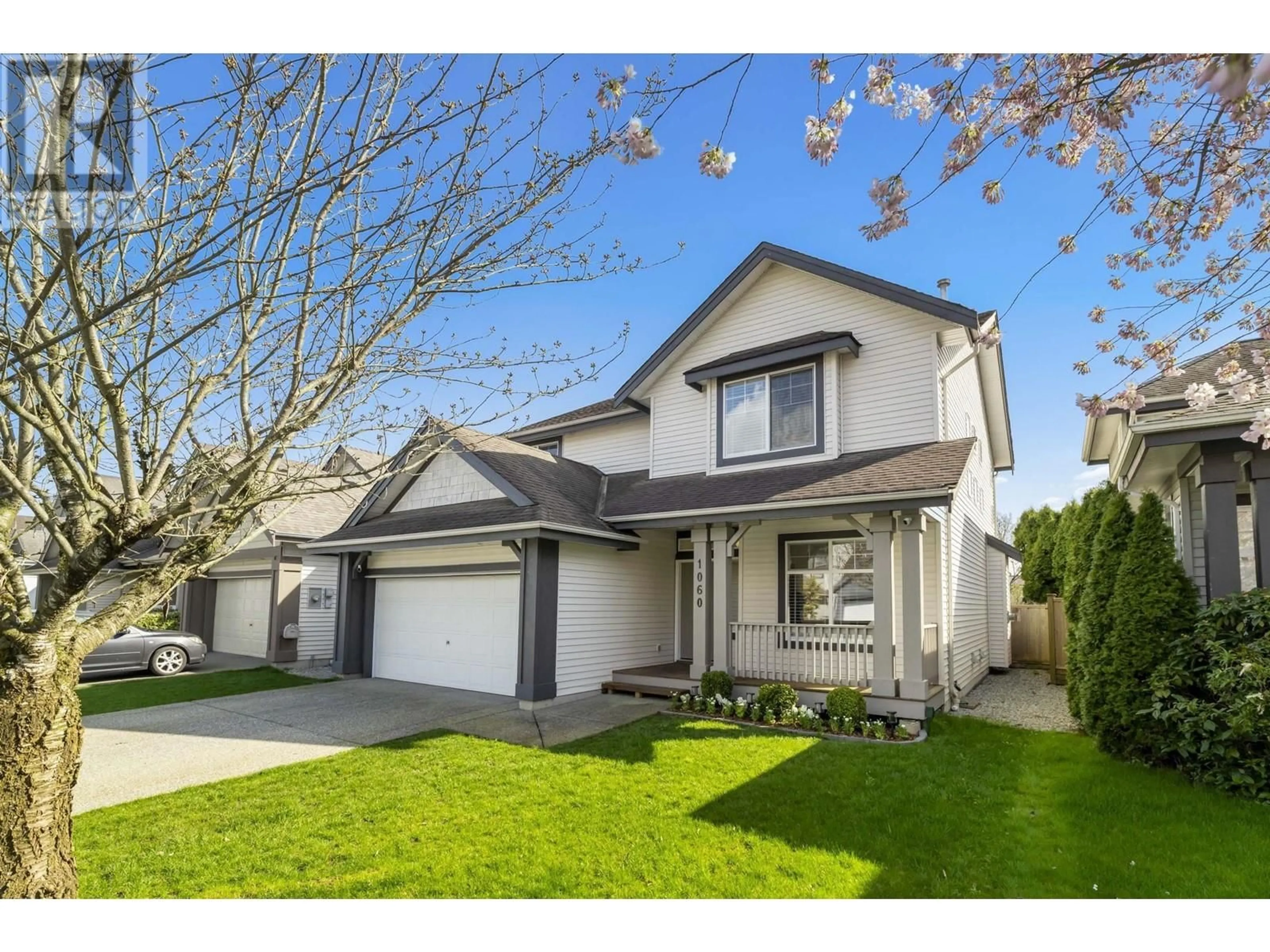 Home with vinyl exterior material, street for 1060 TIGRIS CRESCENT, Port Coquitlam British Columbia V3B8B9