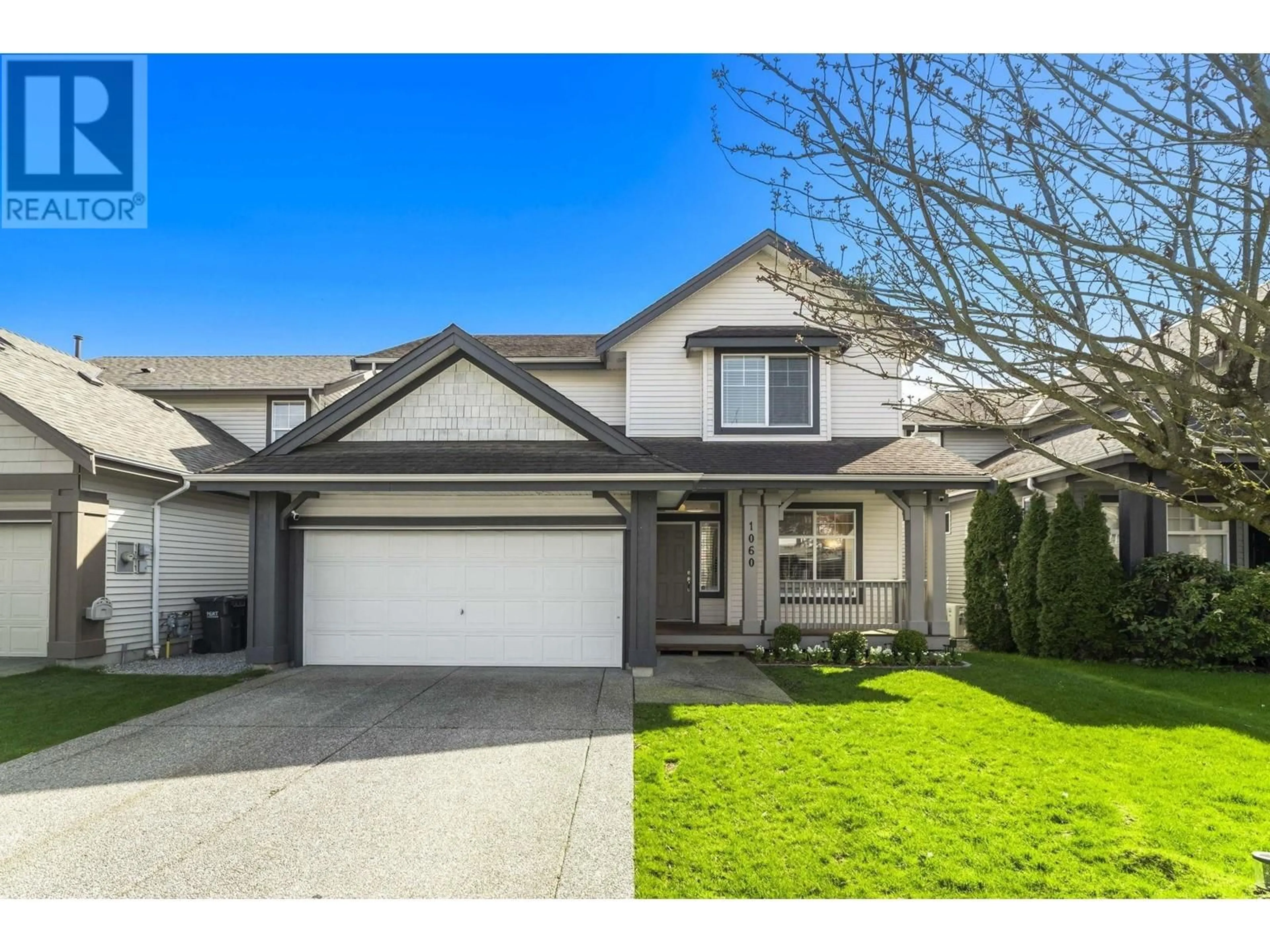 Home with vinyl exterior material, street for 1060 TIGRIS CRESCENT, Port Coquitlam British Columbia V3B8B9