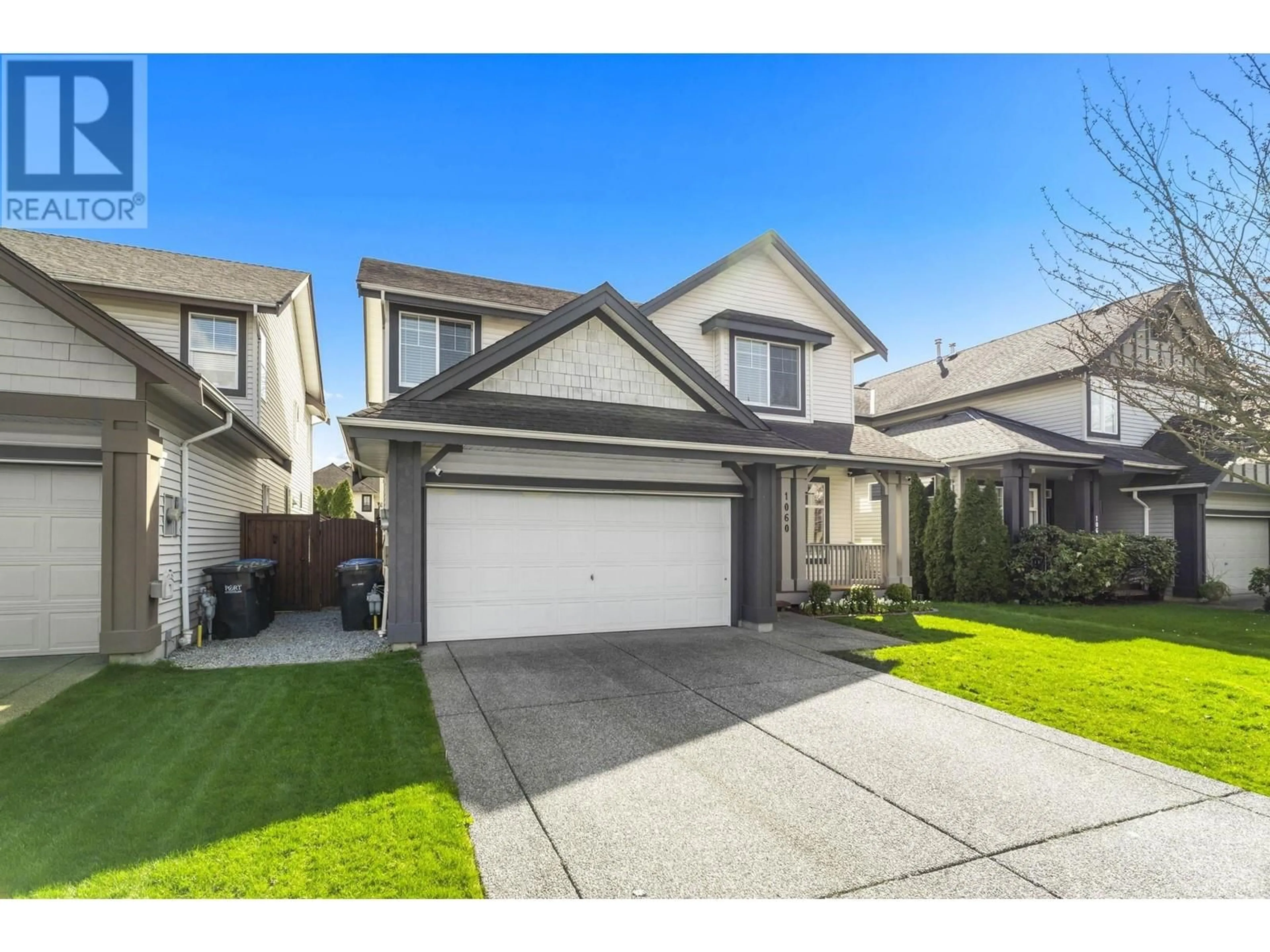 A pic from outside/outdoor area/front of a property/back of a property/a pic from drone, street for 1060 TIGRIS CRESCENT, Port Coquitlam British Columbia V3B8B9