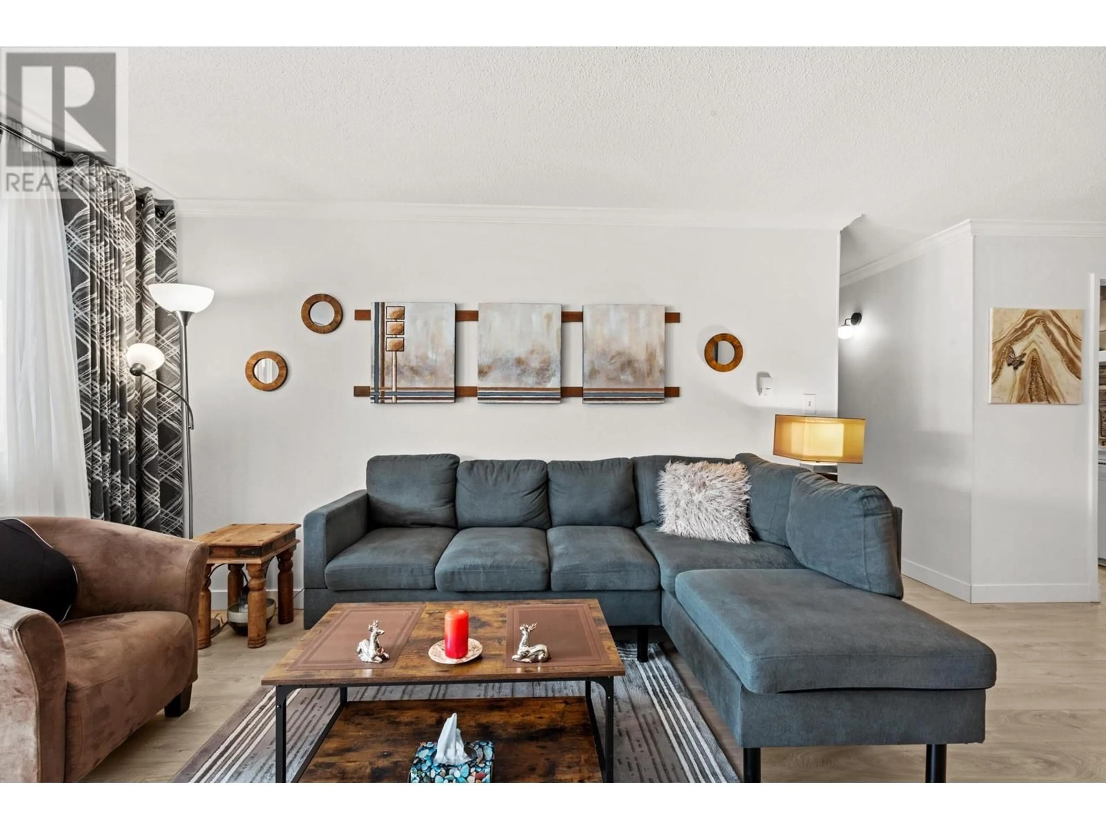 Living room with furniture, wood/laminate floor for 306 - 12096 222 STREET, Maple Ridge British Columbia V2X5W1