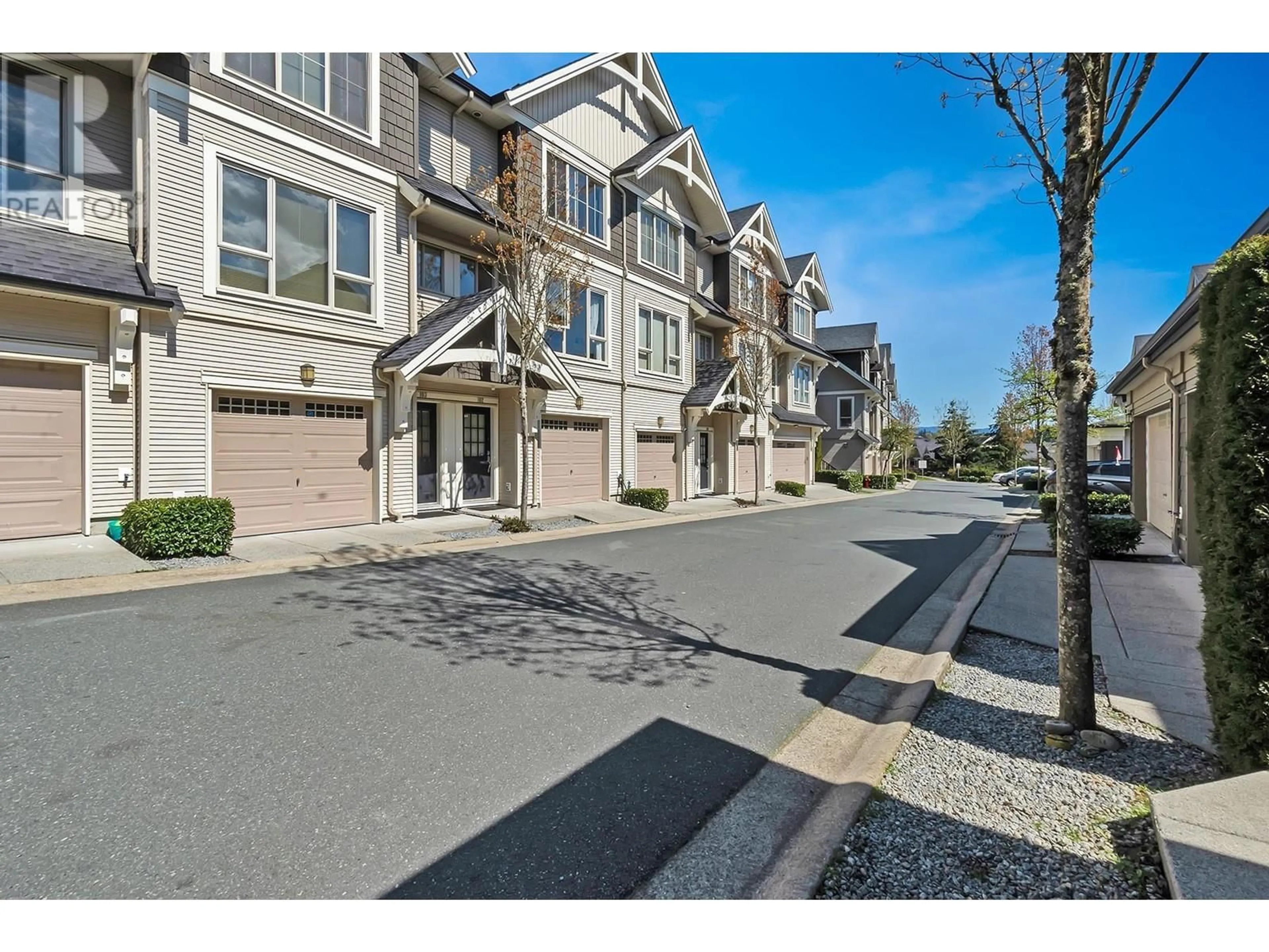 A pic from outside/outdoor area/front of a property/back of a property/a pic from drone, street for 102 - 1369 PURCELL DRIVE, Coquitlam British Columbia V3E0C1