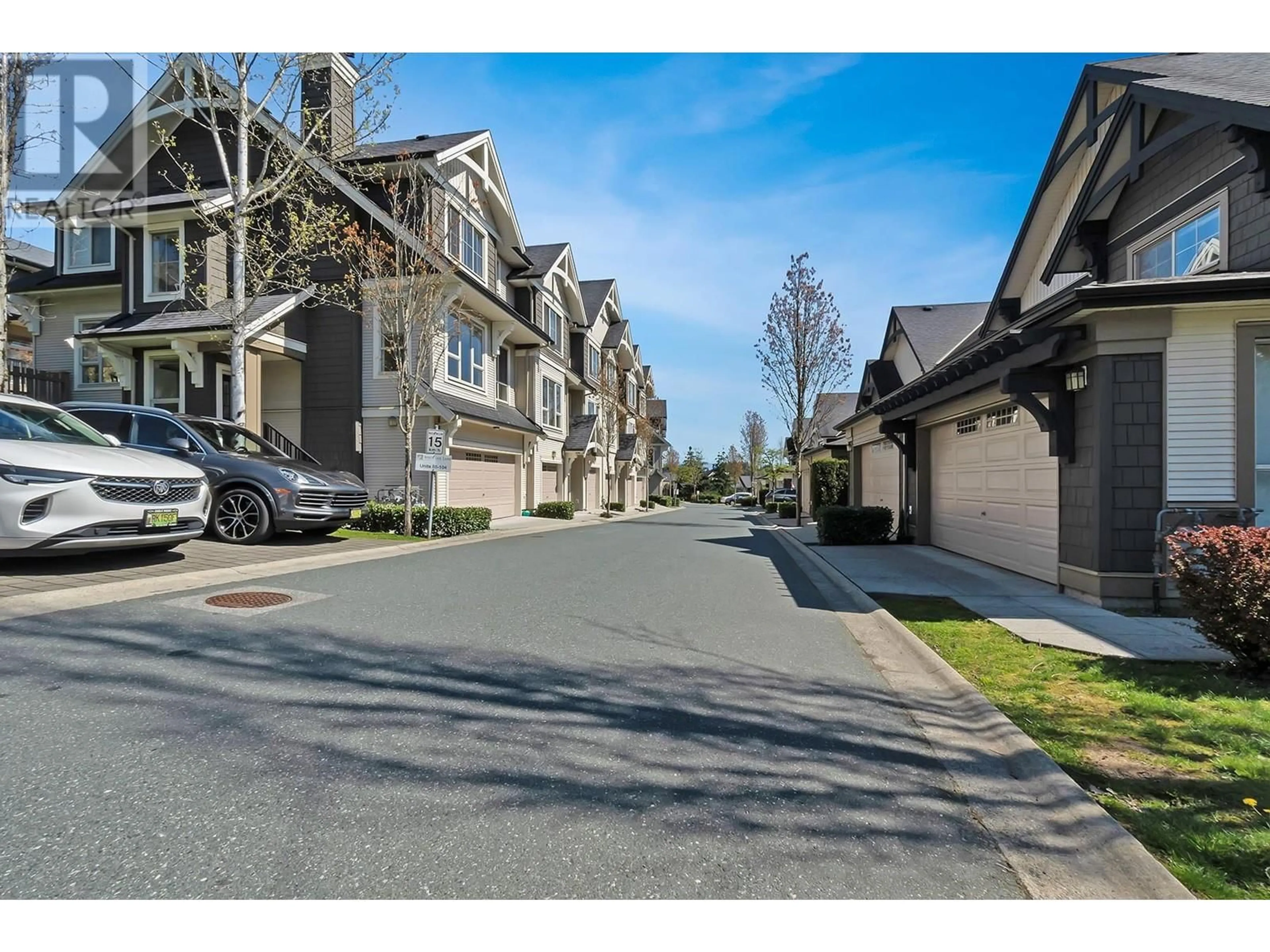A pic from outside/outdoor area/front of a property/back of a property/a pic from drone, street for 102 - 1369 PURCELL DRIVE, Coquitlam British Columbia V3E0C1