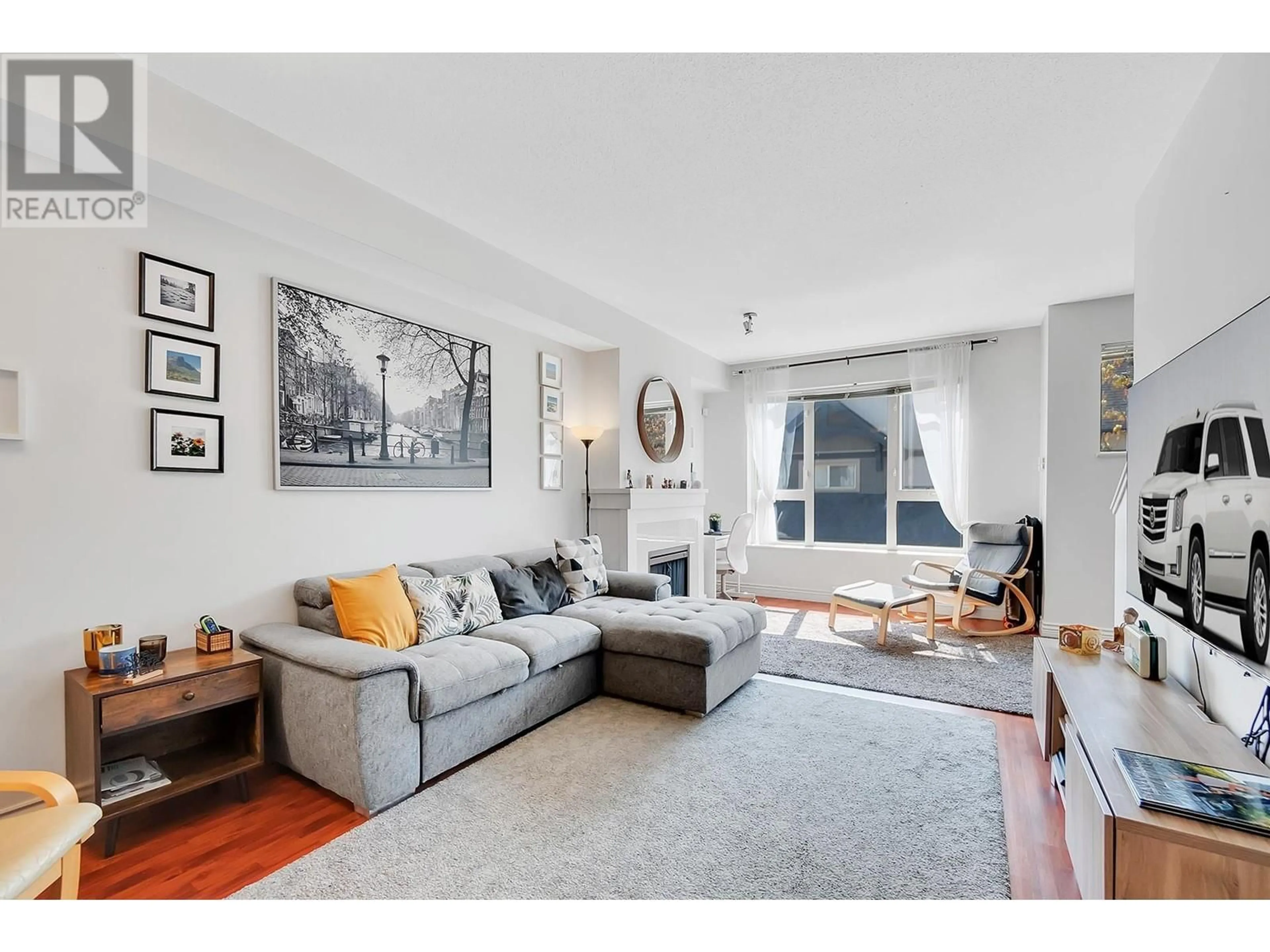 Living room with furniture, unknown for 102 - 1369 PURCELL DRIVE, Coquitlam British Columbia V3E0C1