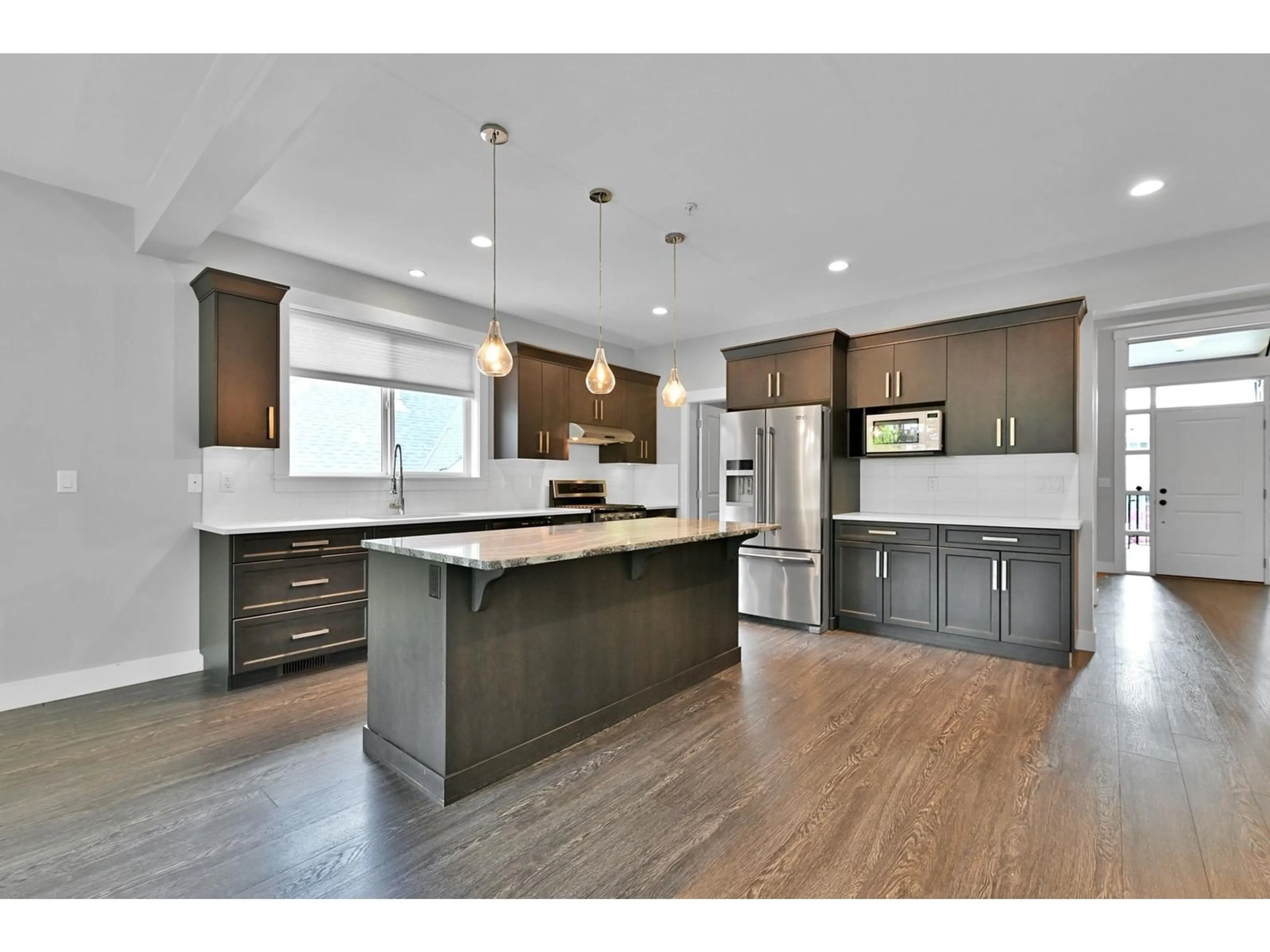 Open concept kitchen, wood/laminate floor for 51020 ZANDER PLACE, Chilliwack British Columbia V4Z0C1