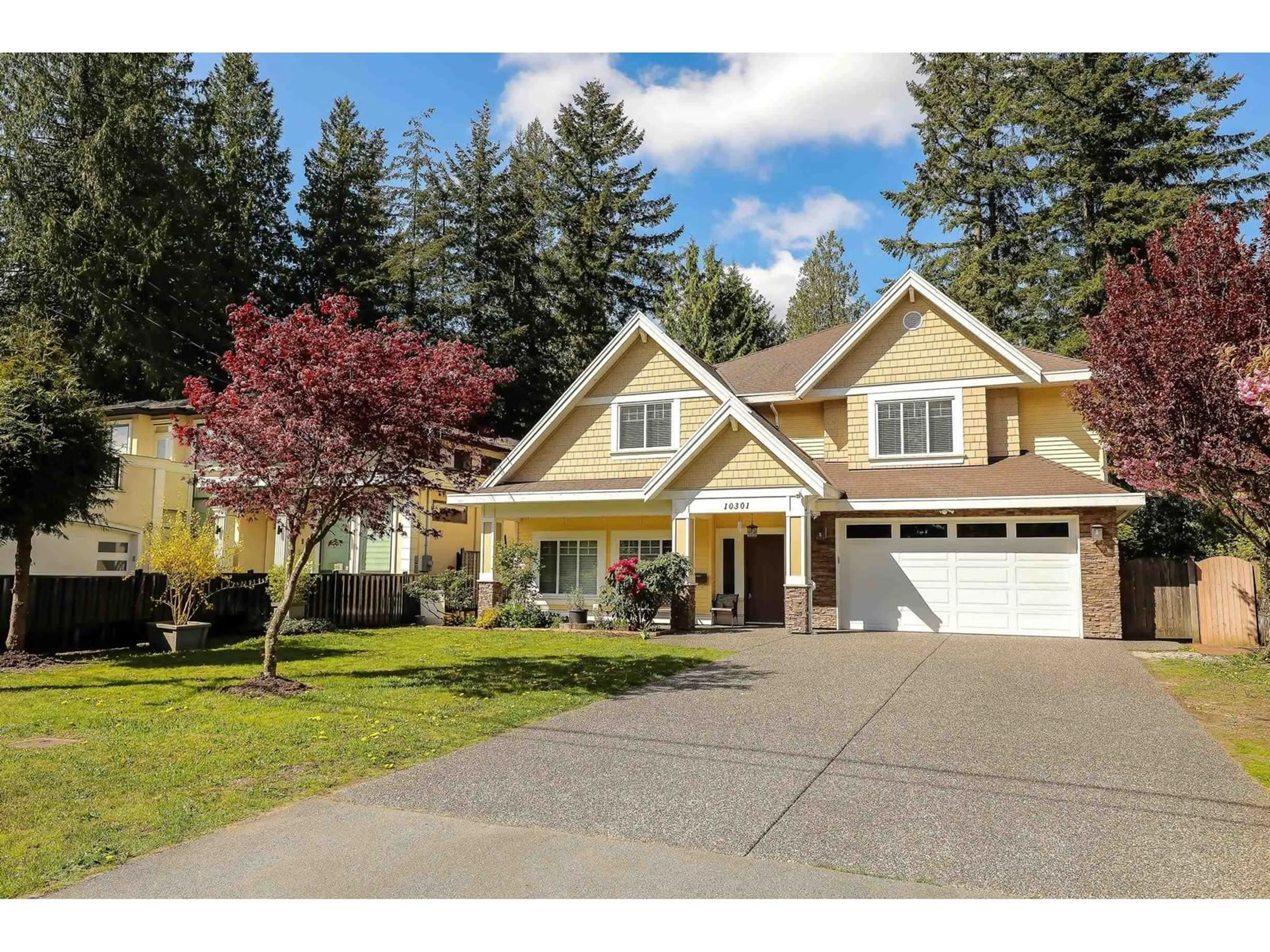Home with vinyl exterior material, street for 10301 155A, Surrey British Columbia V3R4K4
