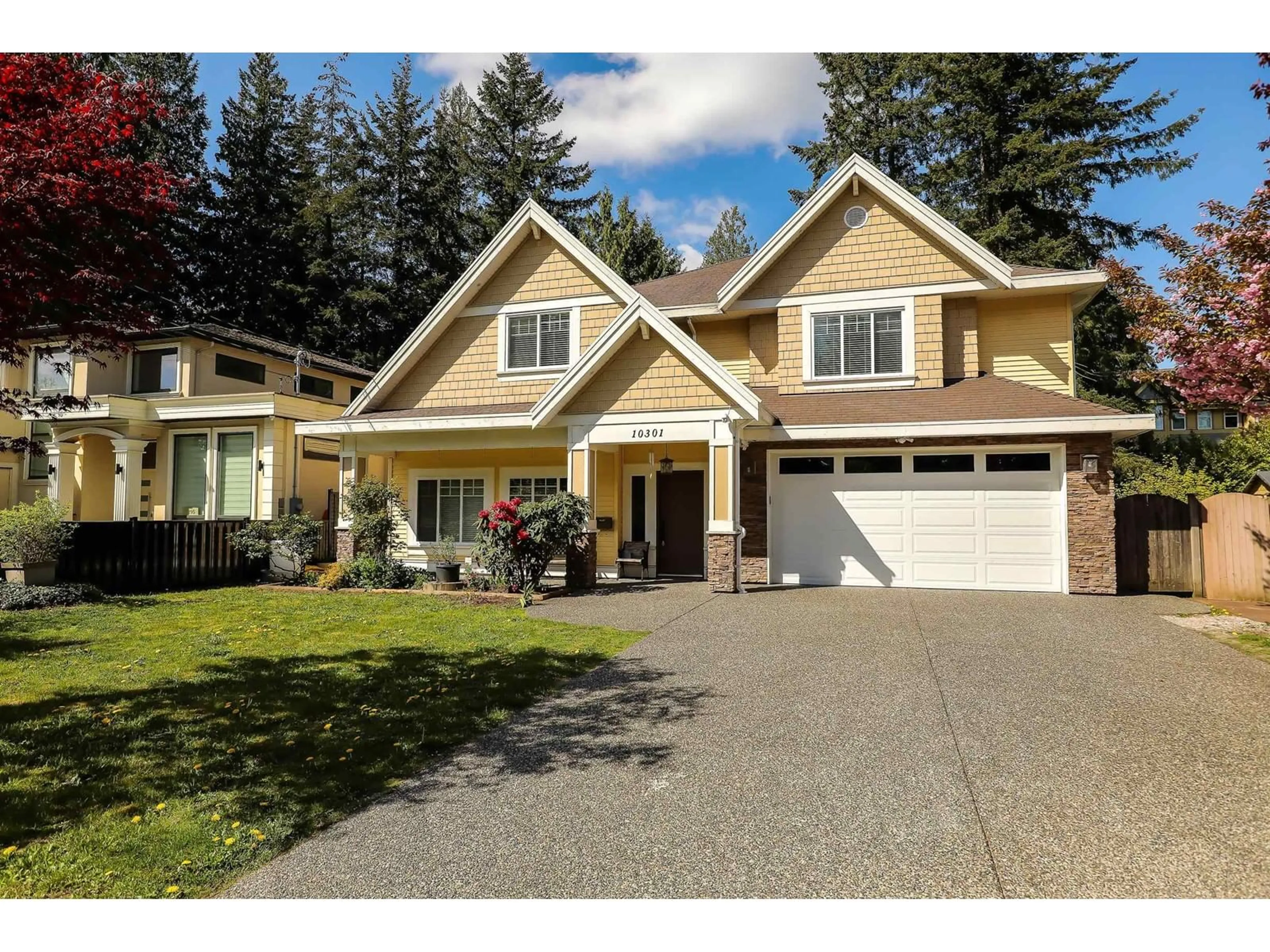 Home with vinyl exterior material, street for 10301 155A, Surrey British Columbia V3R4K4