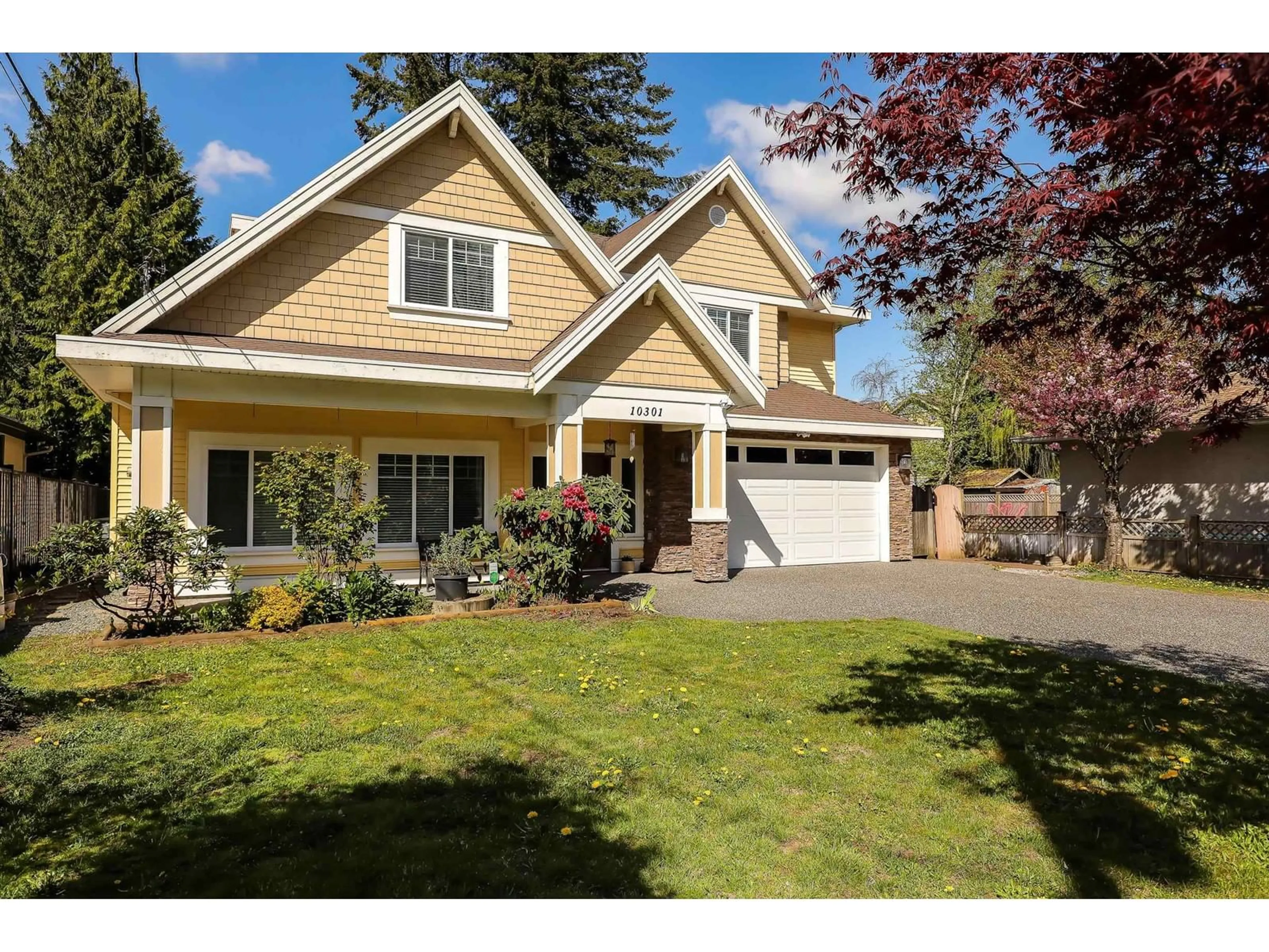 Home with vinyl exterior material, street for 10301 155A, Surrey British Columbia V3R4K4