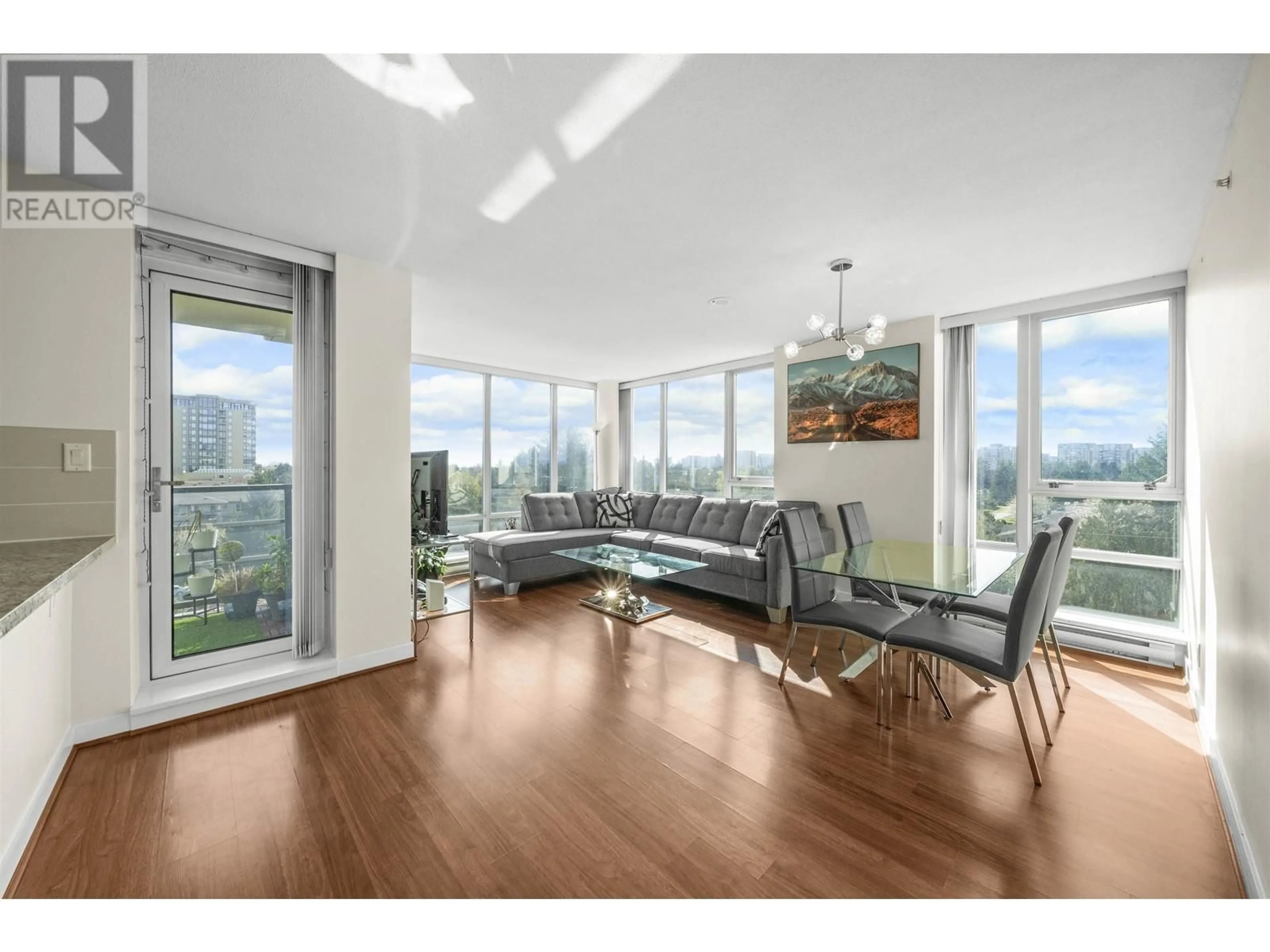 Living room with furniture, wood/laminate floor for 701 - 9171 FERNDALE ROAD, Richmond British Columbia V6Y0A5