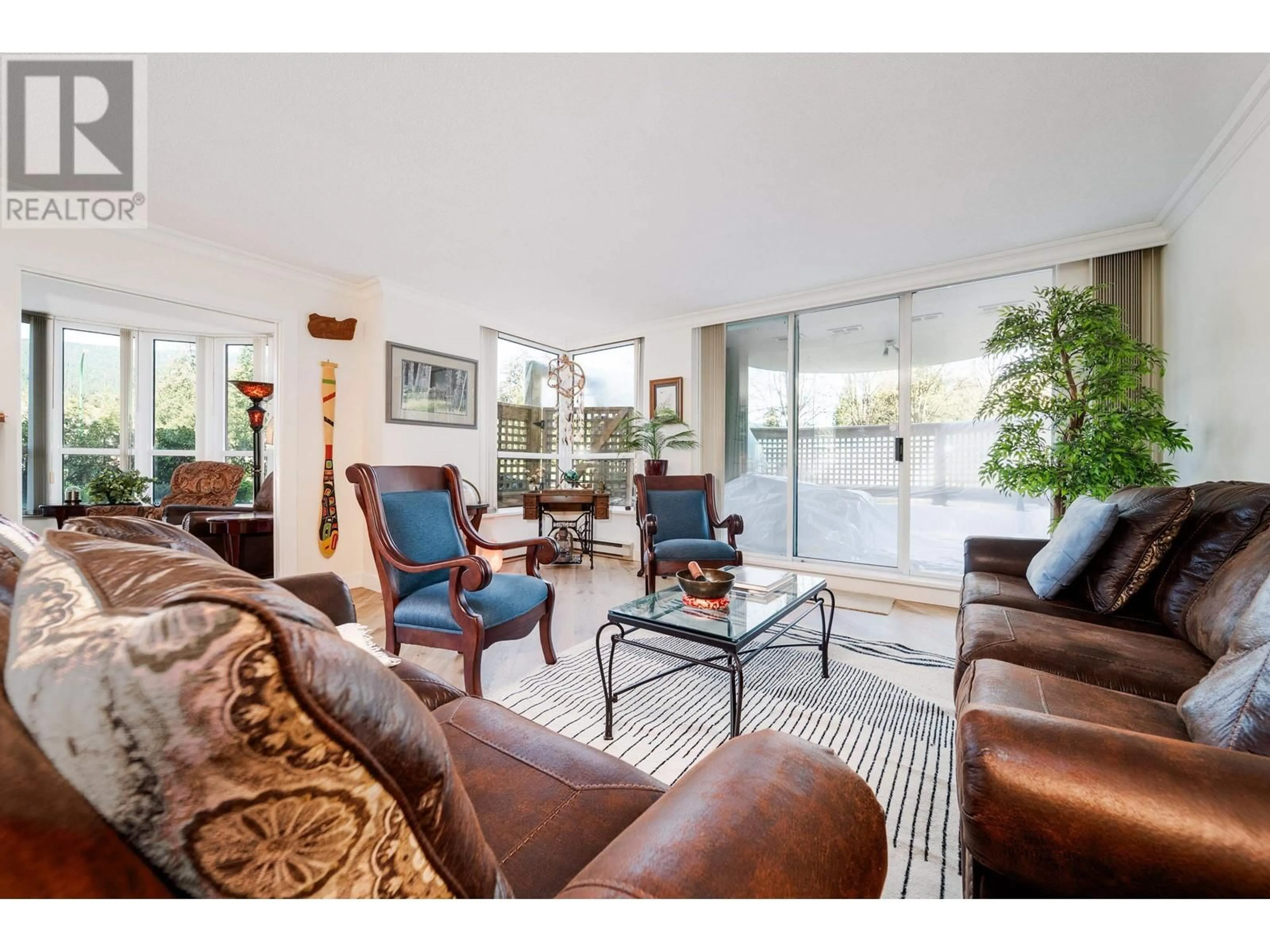 Living room with furniture, unknown for 105 - 995 ROCHE POINT DRIVE, North Vancouver British Columbia V7H2X4