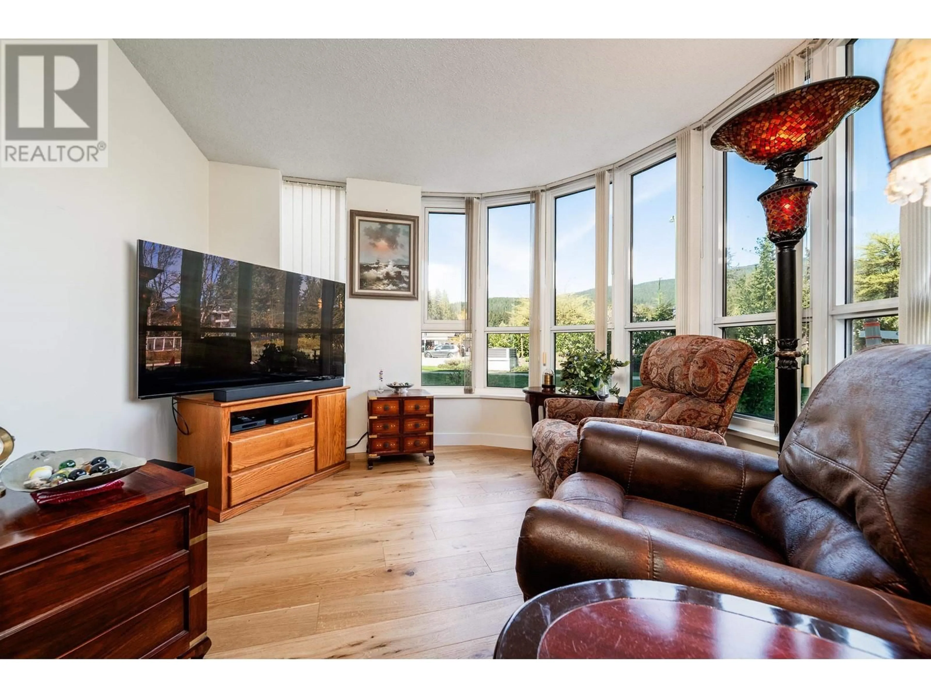 Living room with furniture, unknown for 105 - 995 ROCHE POINT DRIVE, North Vancouver British Columbia V7H2X4