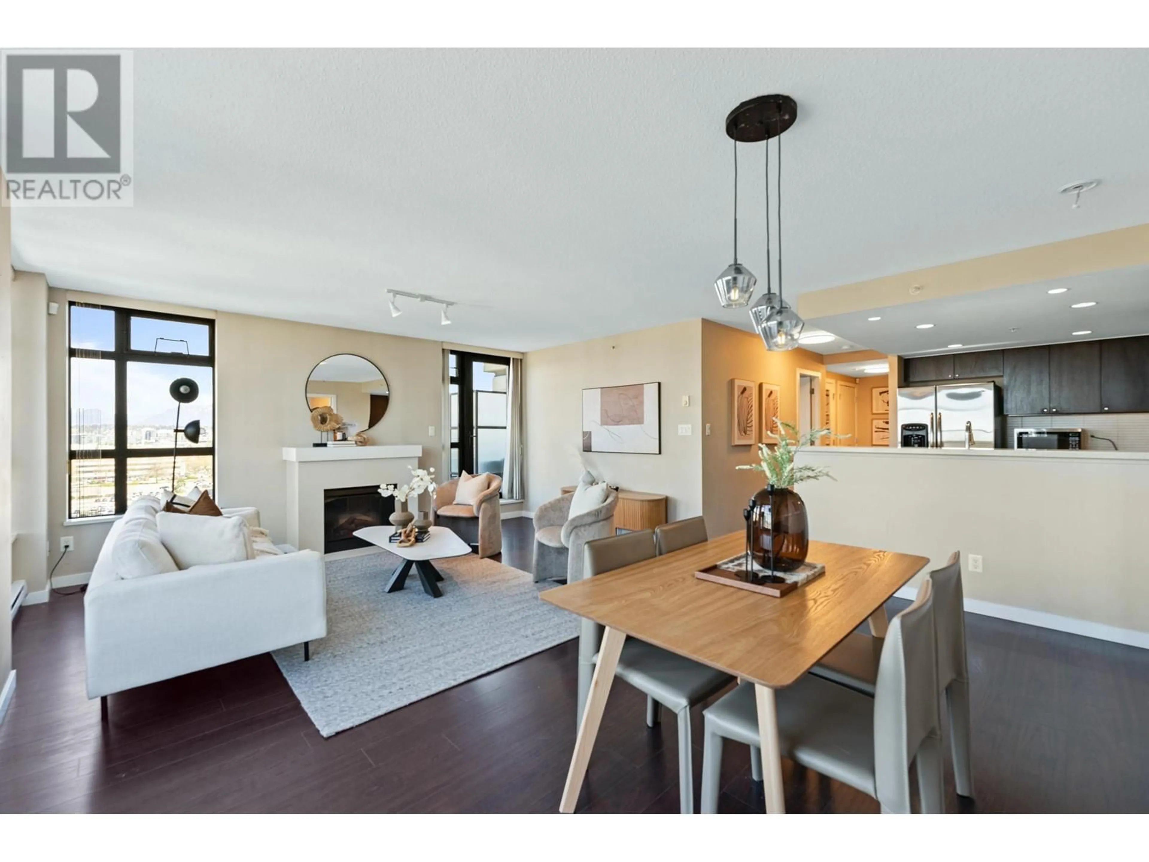 Open concept kitchen, wood/laminate floor for 1301 - 8120 LANSDOWNE ROAD, Richmond British Columbia V6X0A1