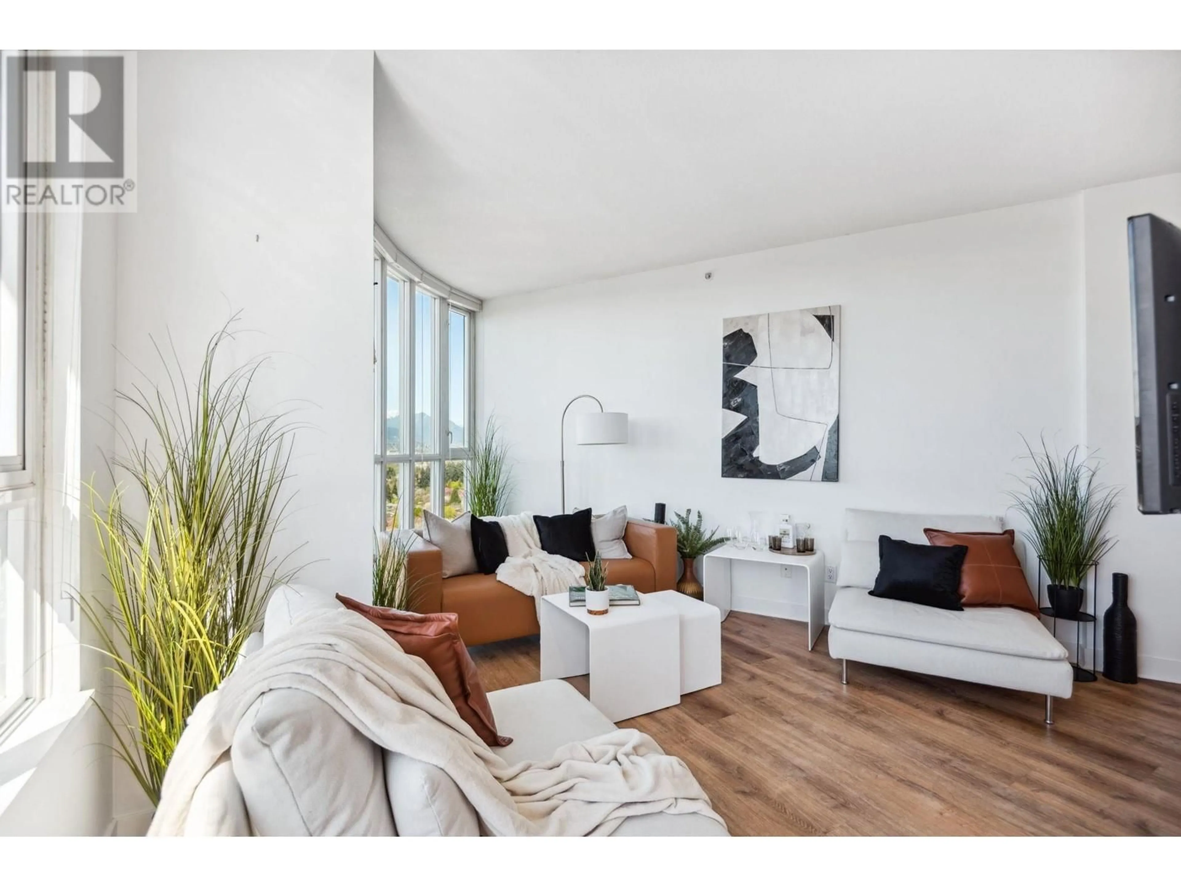 Living room with furniture, wood/laminate floor for 1604 - 4028 KNIGHT STREET, Vancouver British Columbia V5N5Y8